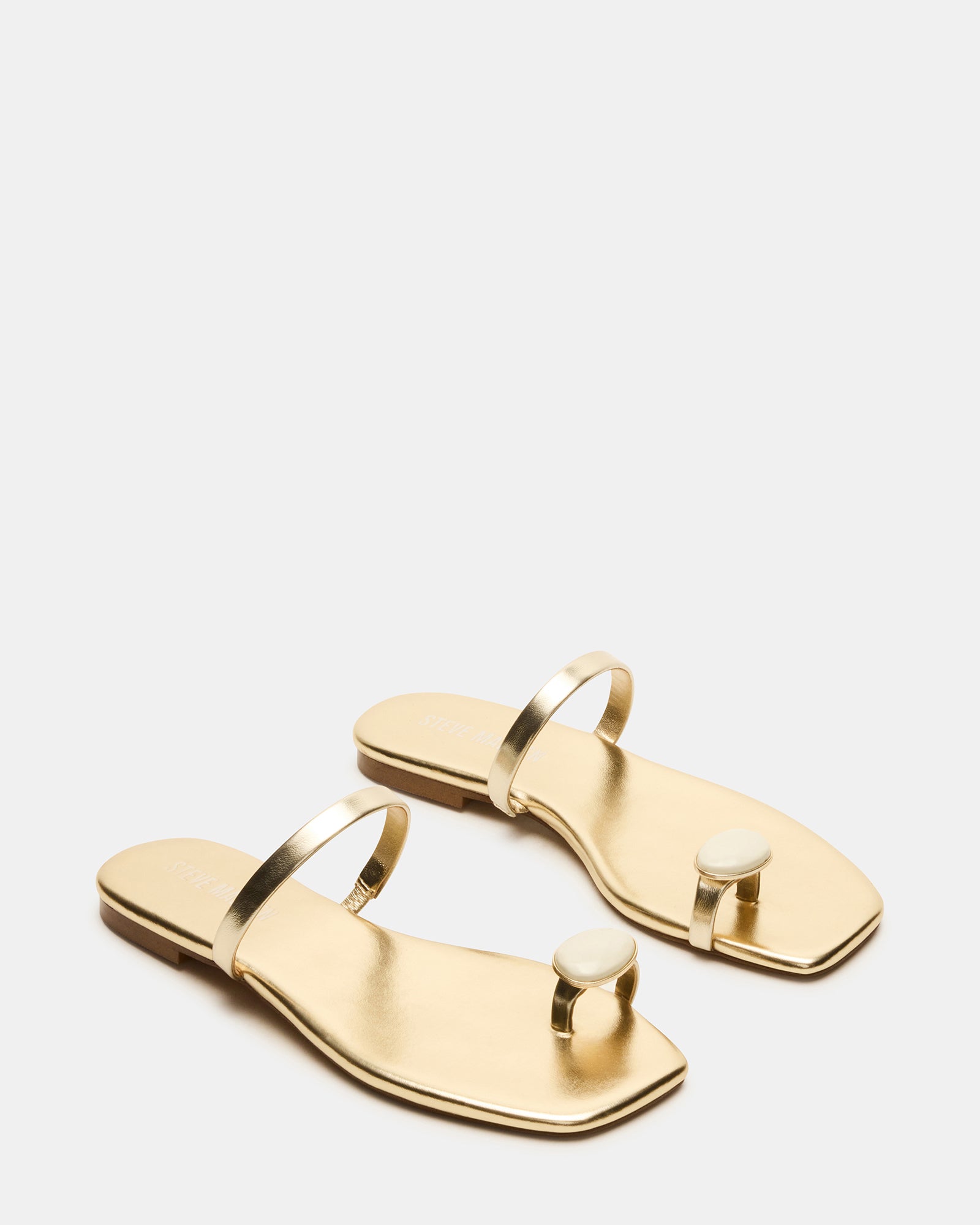 Close-up of square-toe sandals highlighting vegan leather texture