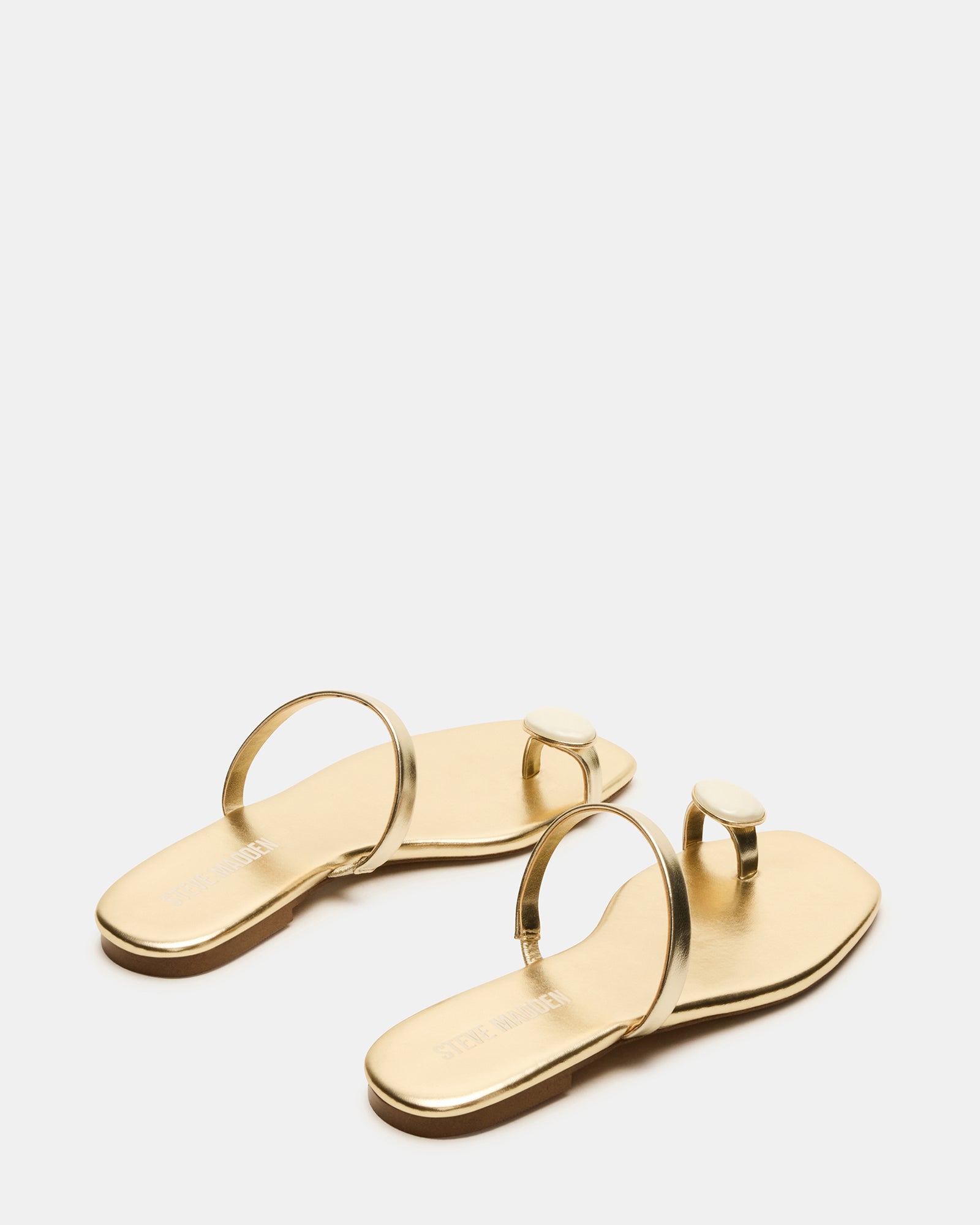 Close-up of square-toe sandals highlighting vegan leather texture