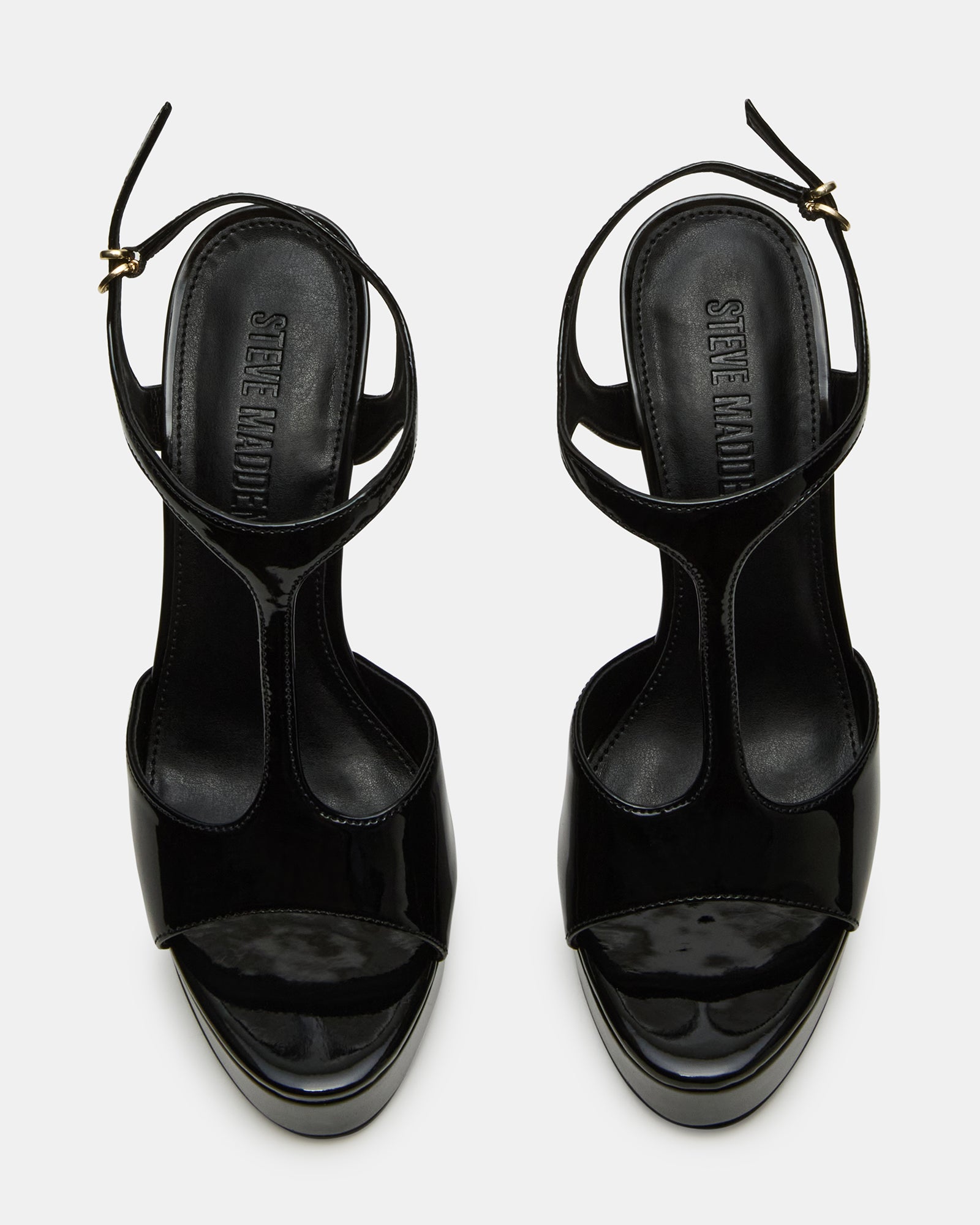 Black platform high heels worn with skinny jeans for night out