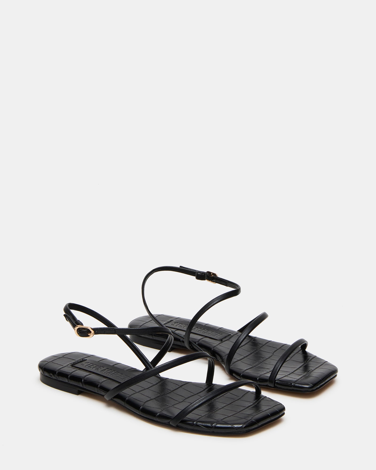 Close-up of black dress sandals womens with comfortable fit.