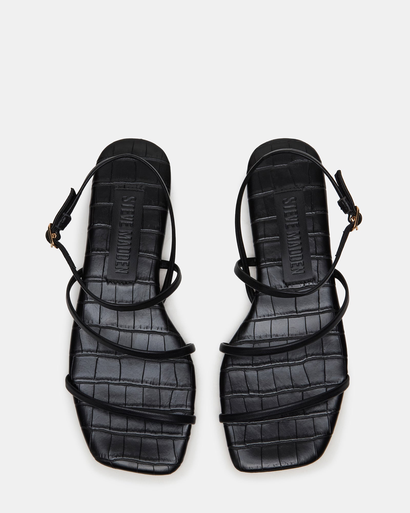 Top view of vegan leather platform sandals showcasing strappy design.