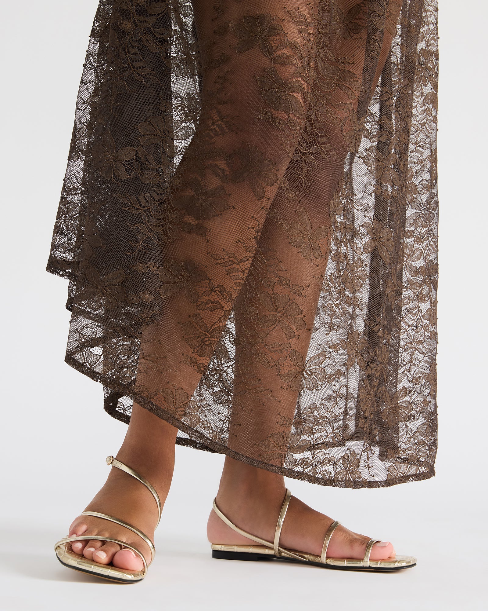 Side profile of the stylish square toe heeled sandals perfect for evening wear