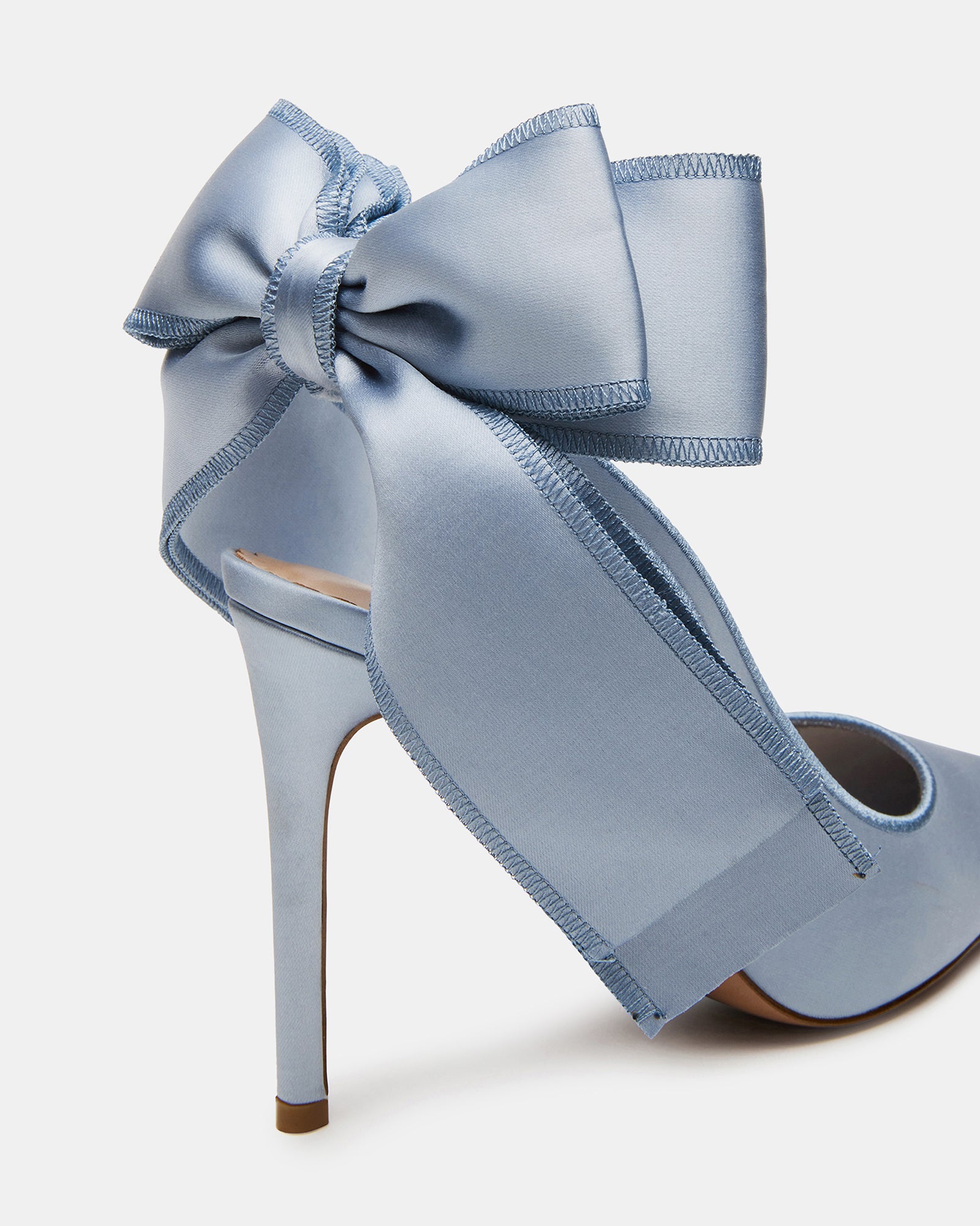 Side view of blue satin pointed toe slingback heels with bow detail