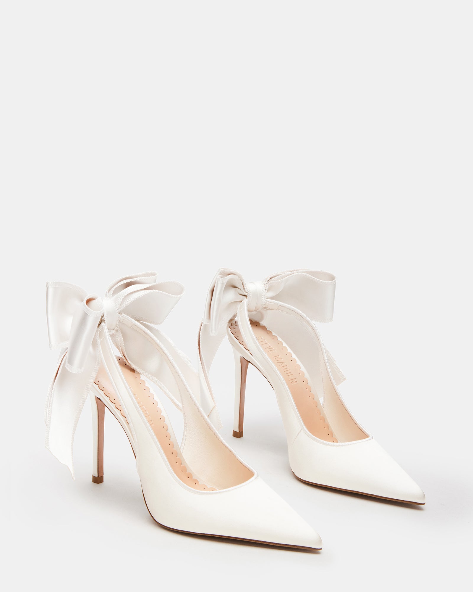 Side view showcasing the stiletto heel and slingback strap