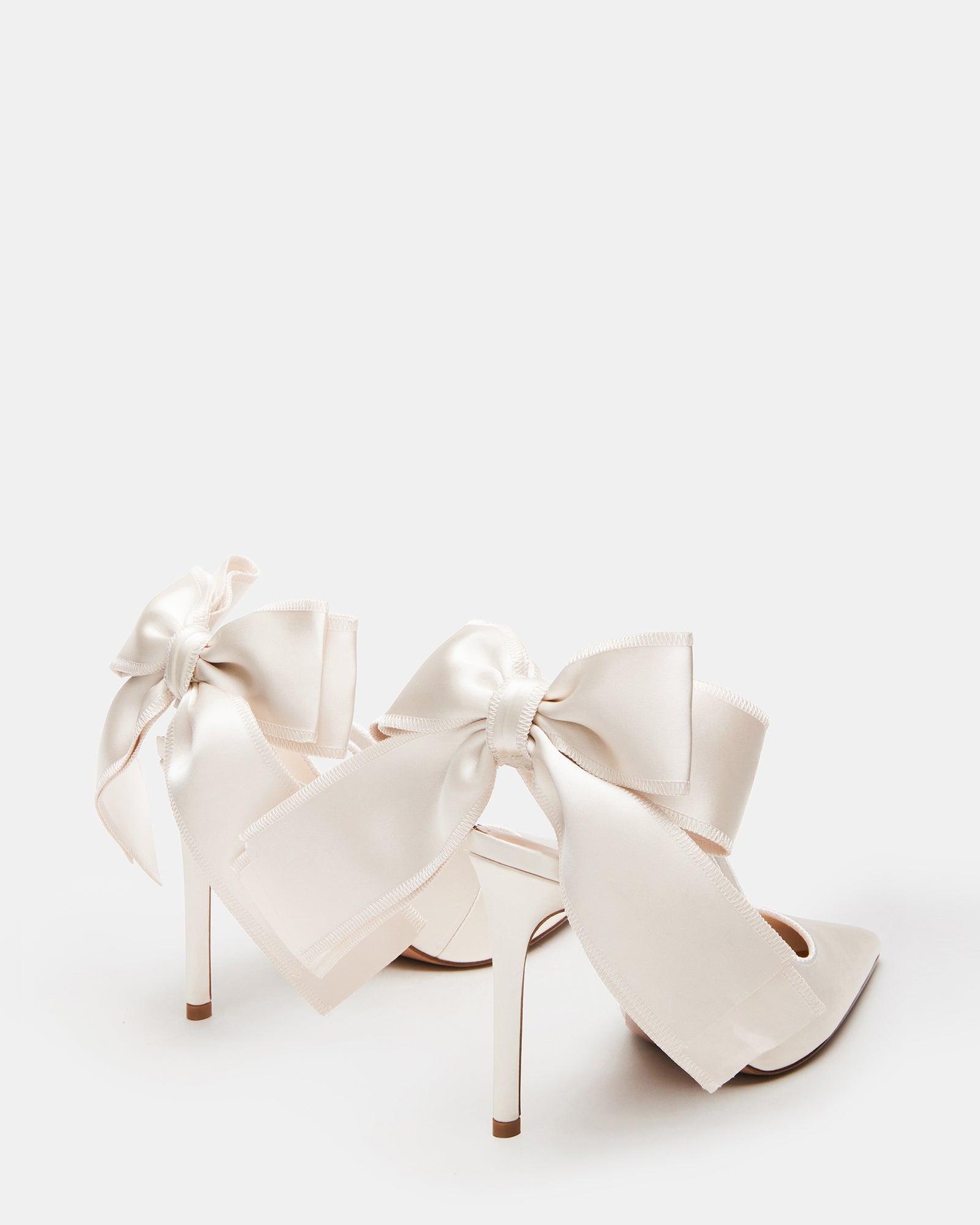 Side view showcasing the stiletto heel and slingback strap