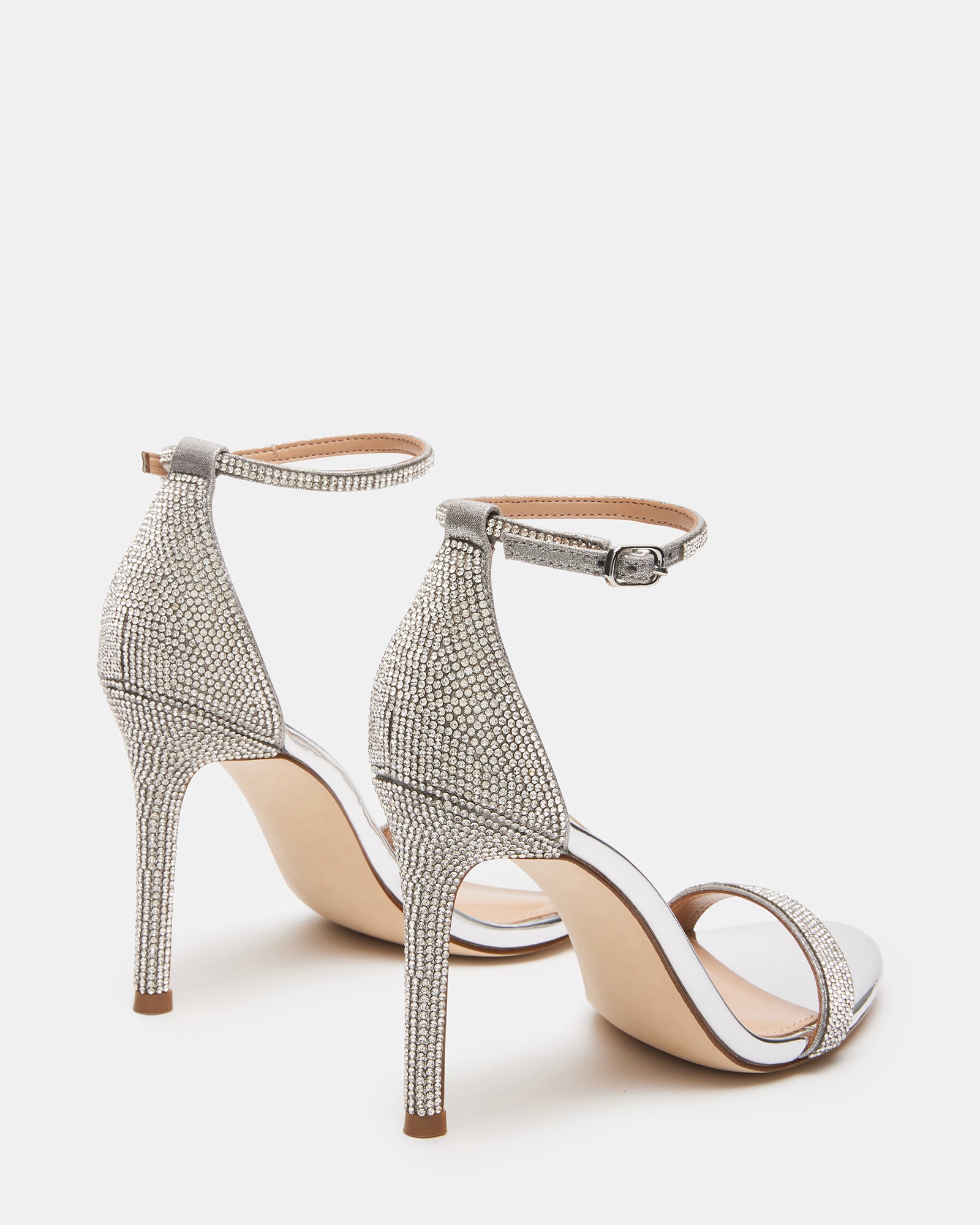 Side view of Tecy sandals highlighting the 3.75-inch stiletto heels and delicate design.