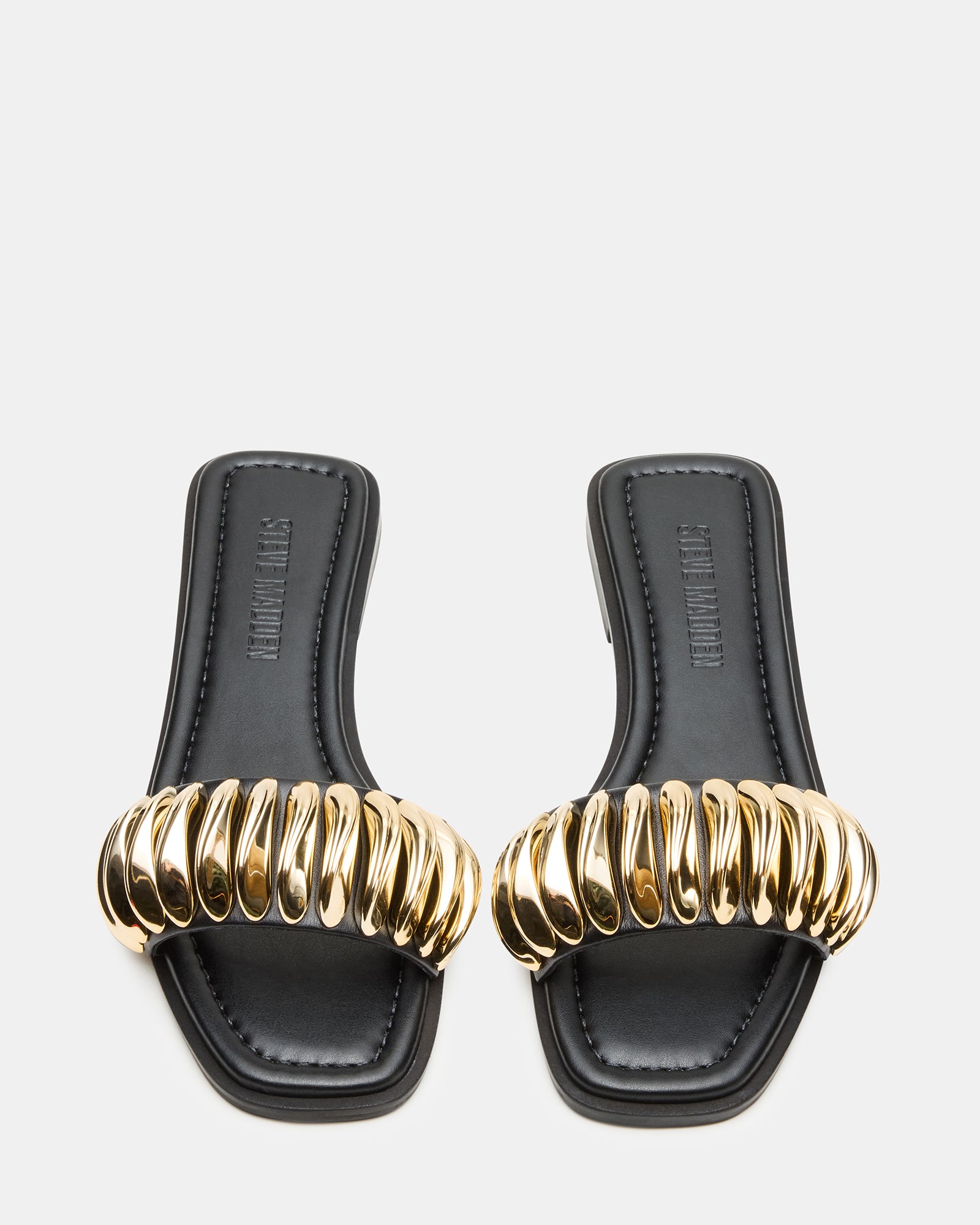 Close-up of Tetris Black slide sandals showcasing square toe design.