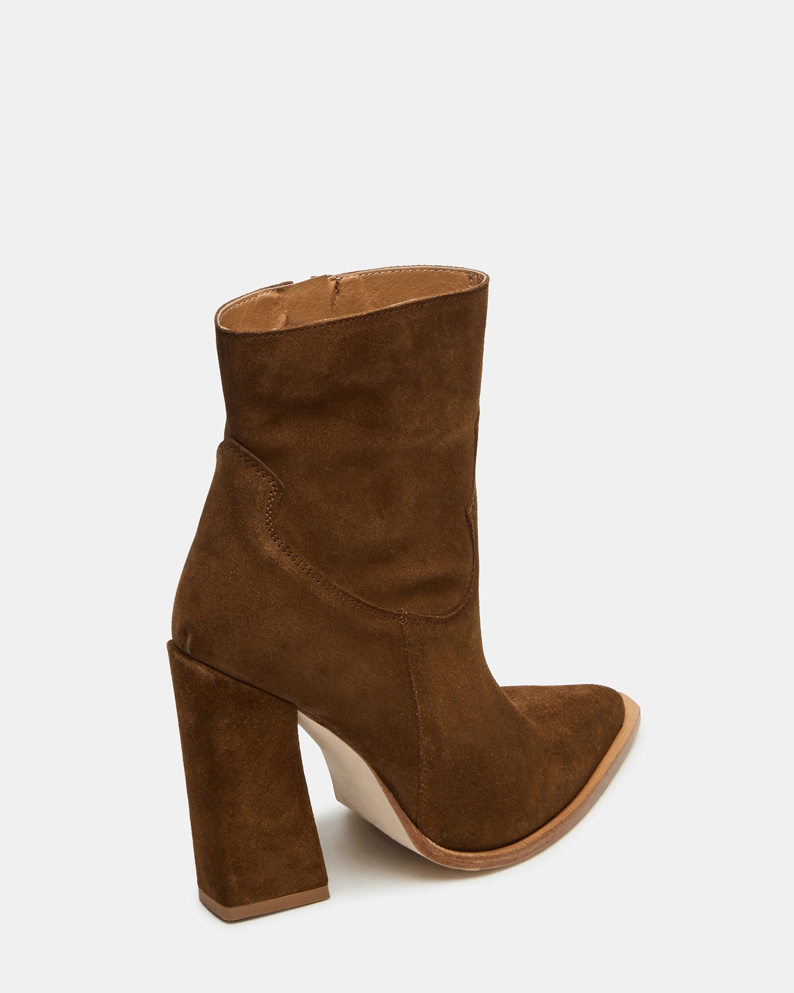 Front angle of black ankle boots styled with denim for casual wear