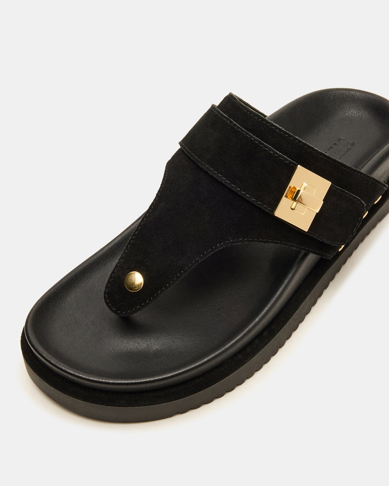 Black thong sandals and straw bag set for everyday wear.