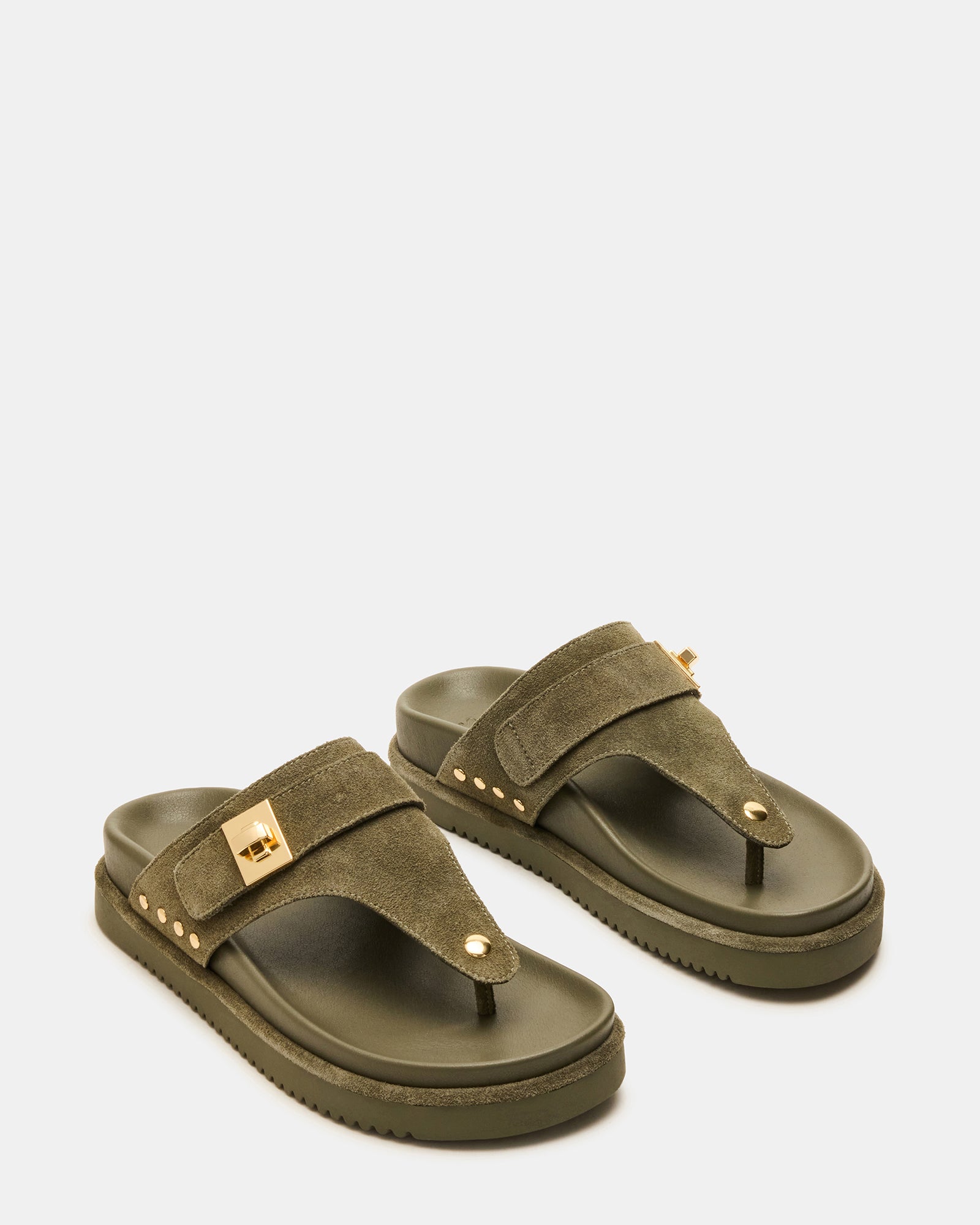 Top-down angle of thong sandal footbed and suede strap detail
