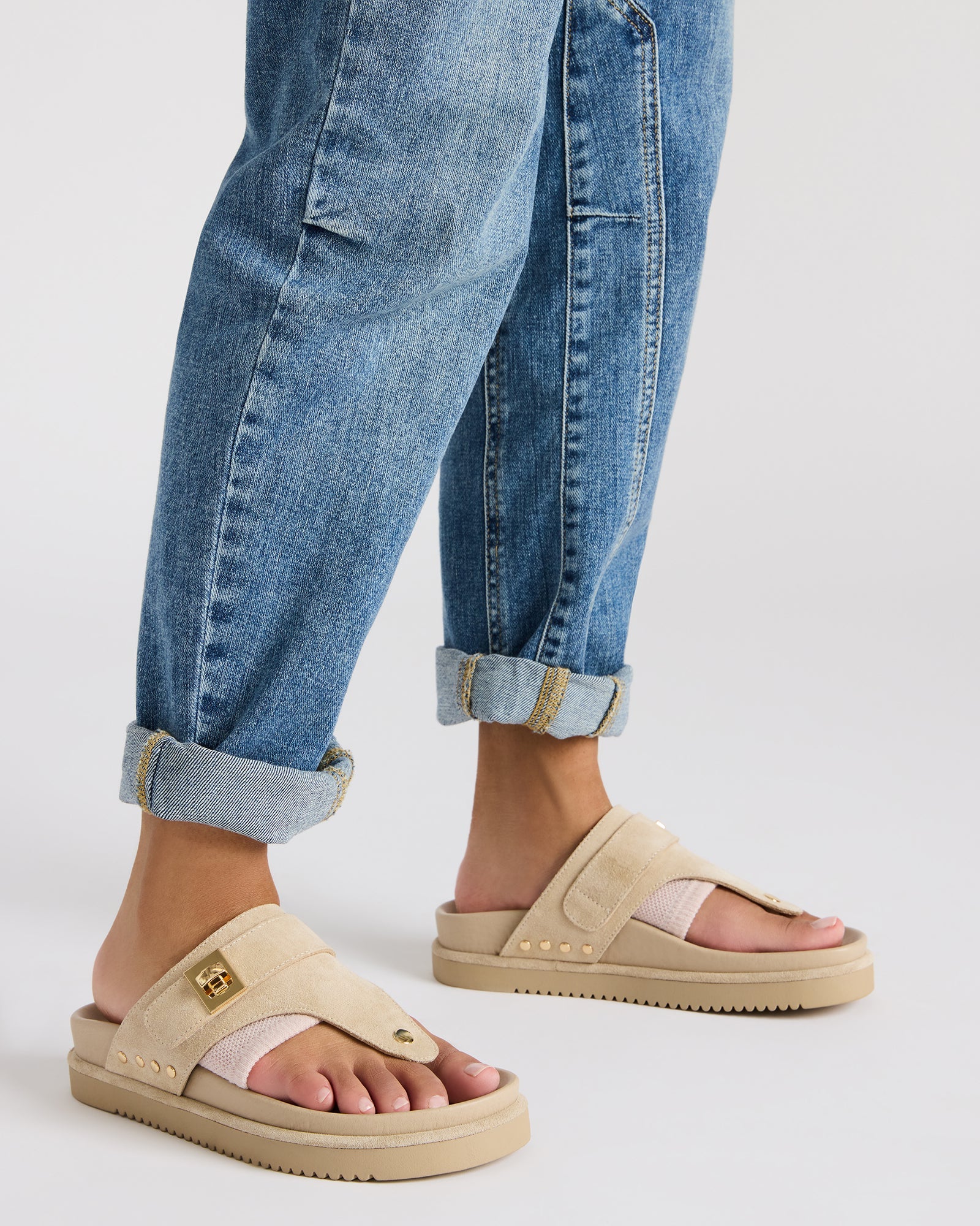 White platform sandals with supportive footbed, ideal for daily wear