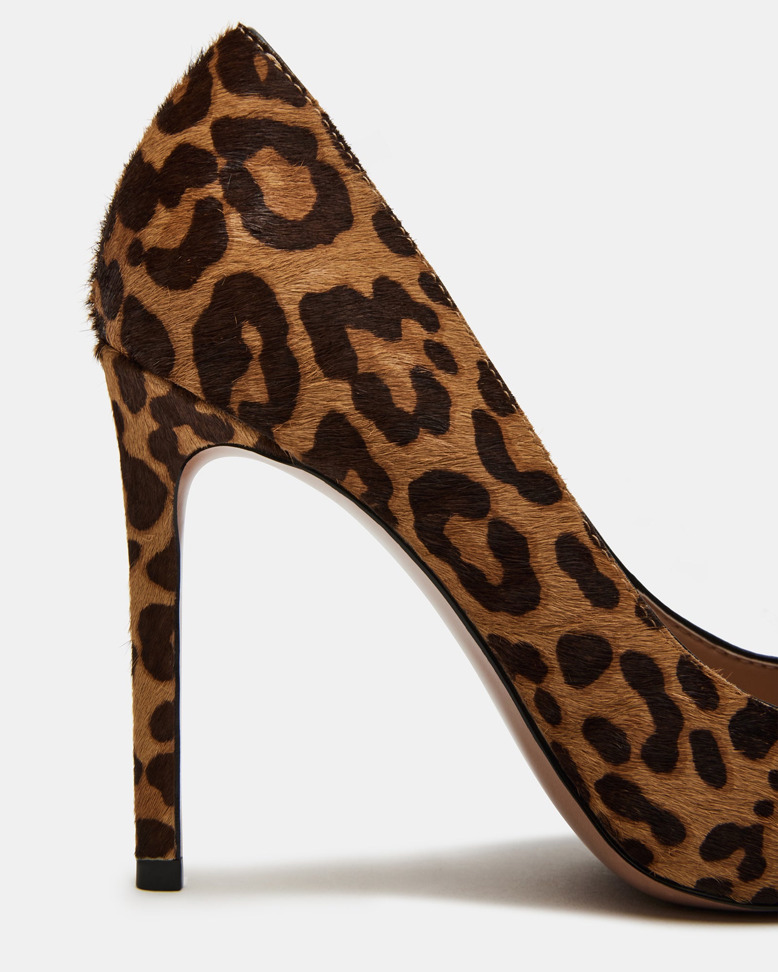 Close-up of leopard print heels with pointed toe design and 4-inch stiletto heel
