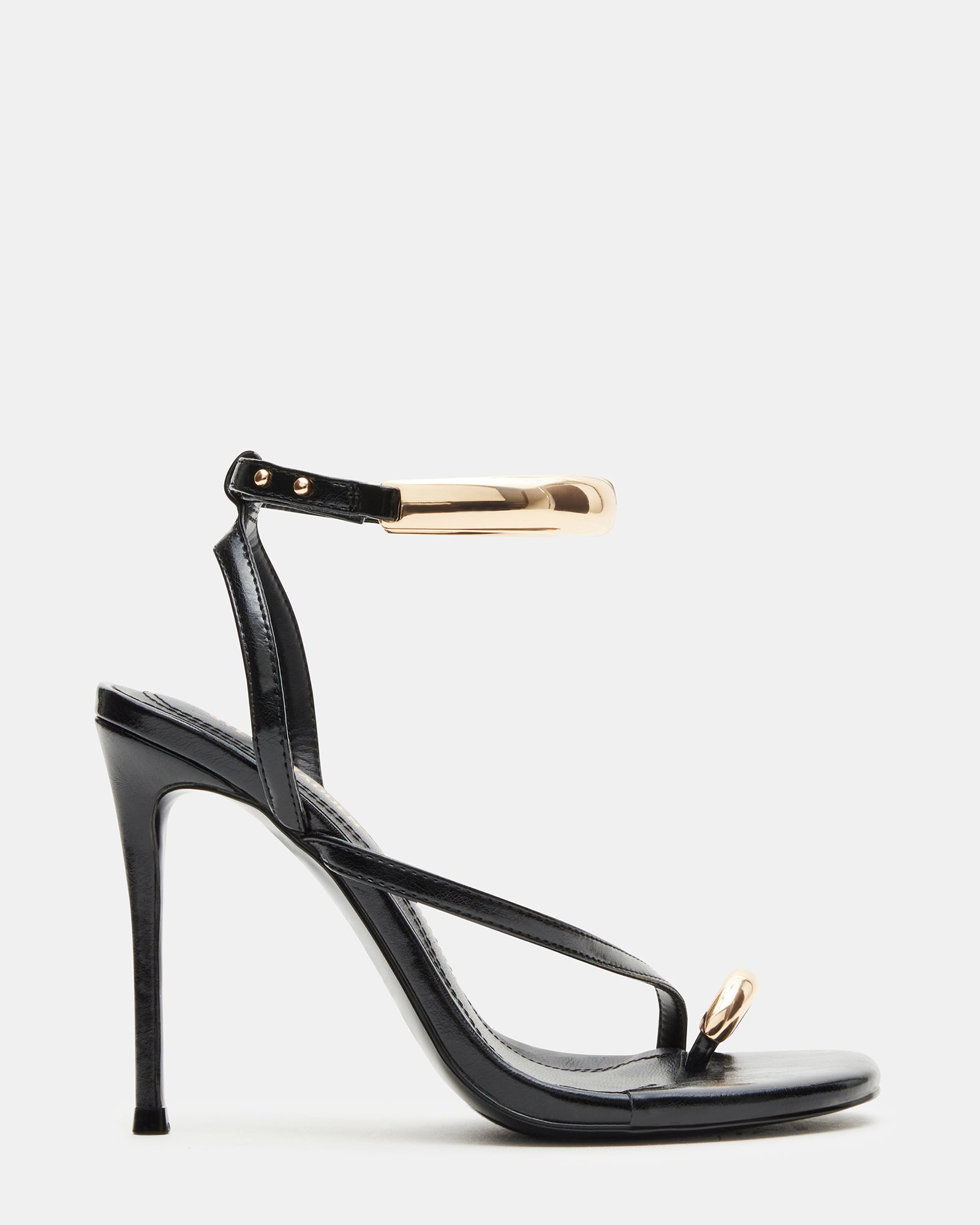 Black stiletto heels with gold hardware accents, front view