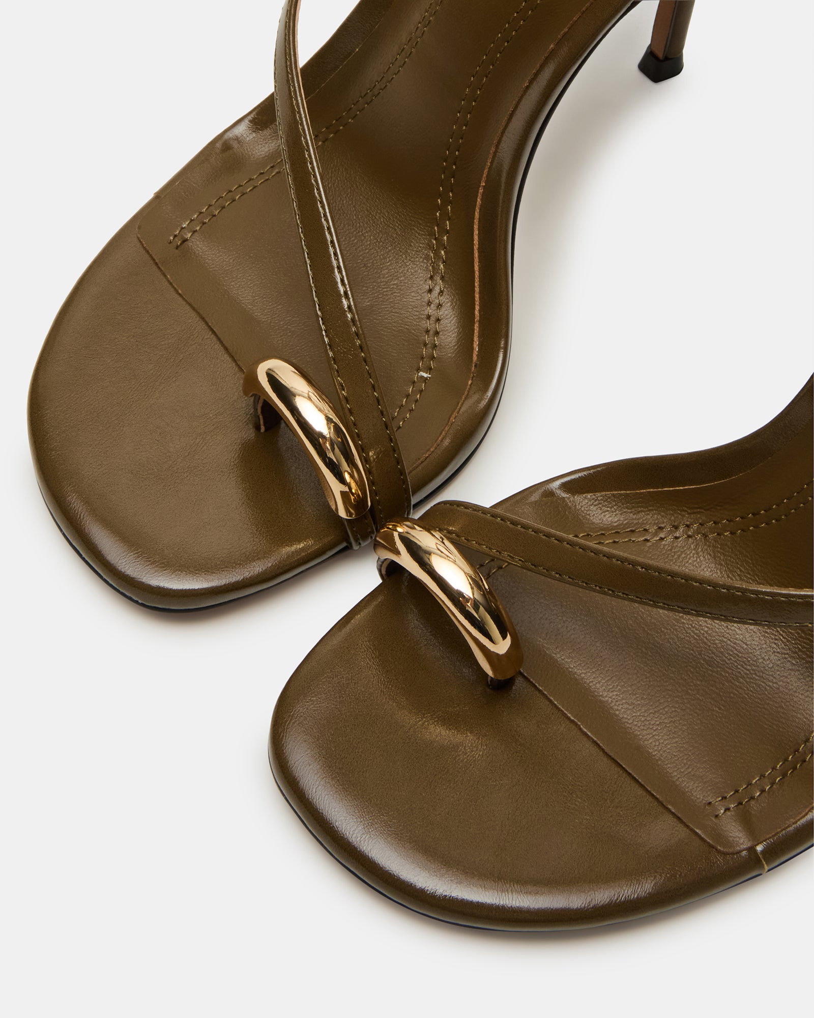 Gold sandals high heels silver accents, perfect for evening wear.