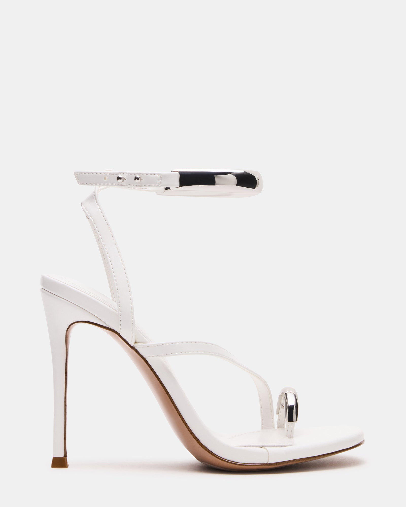 Close-up of Tia black stiletto heels showing gold hardware details