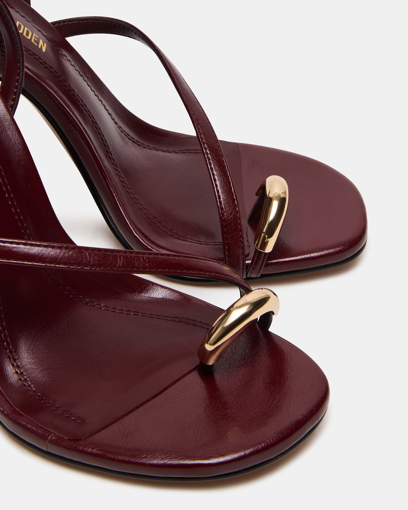 Side view of stiletto heels showing heel height