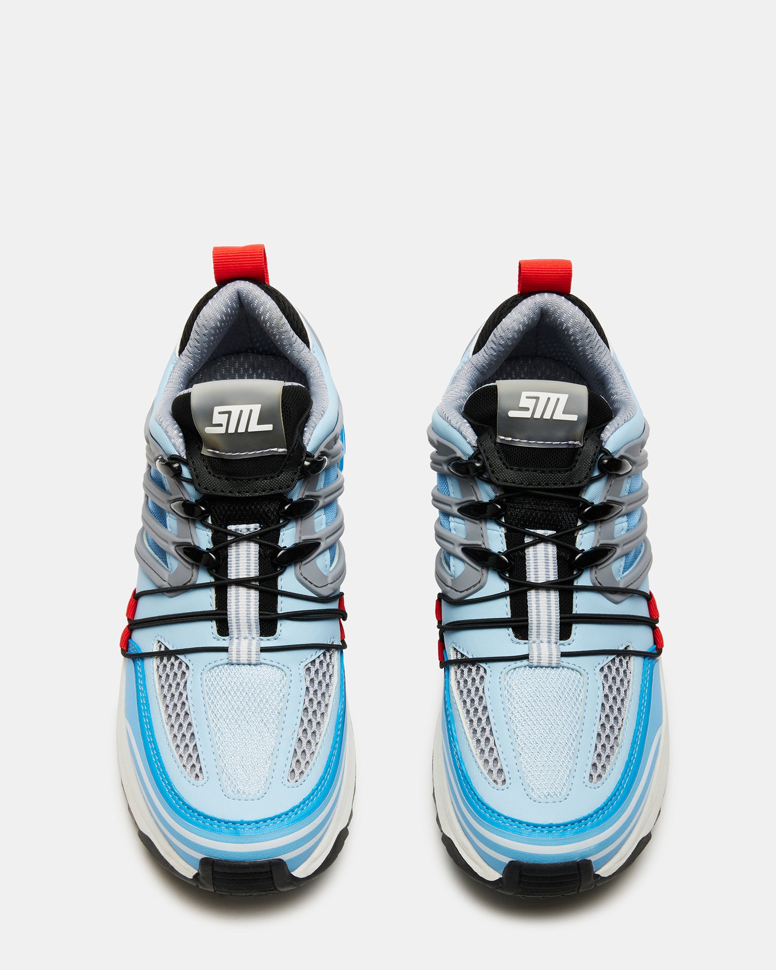 Side view of black platform sneakers highlighting the chunky treaded sole