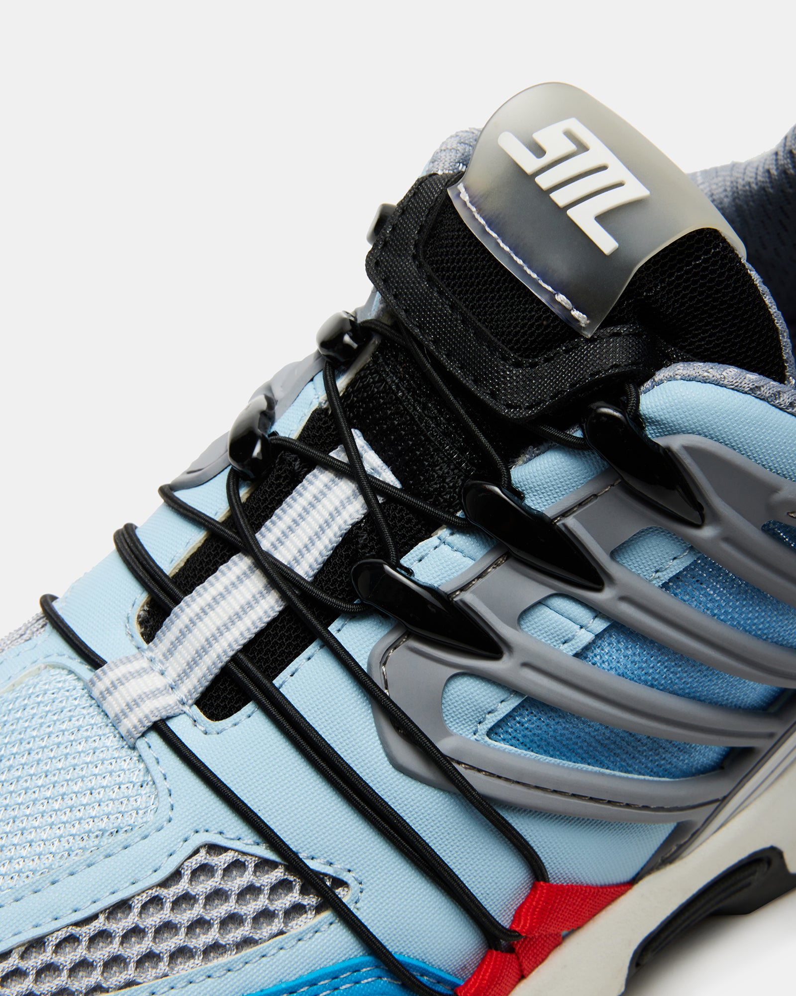 Close-up of Tommy Blue Chunky Platform Sneakers showcasing the mesh panels