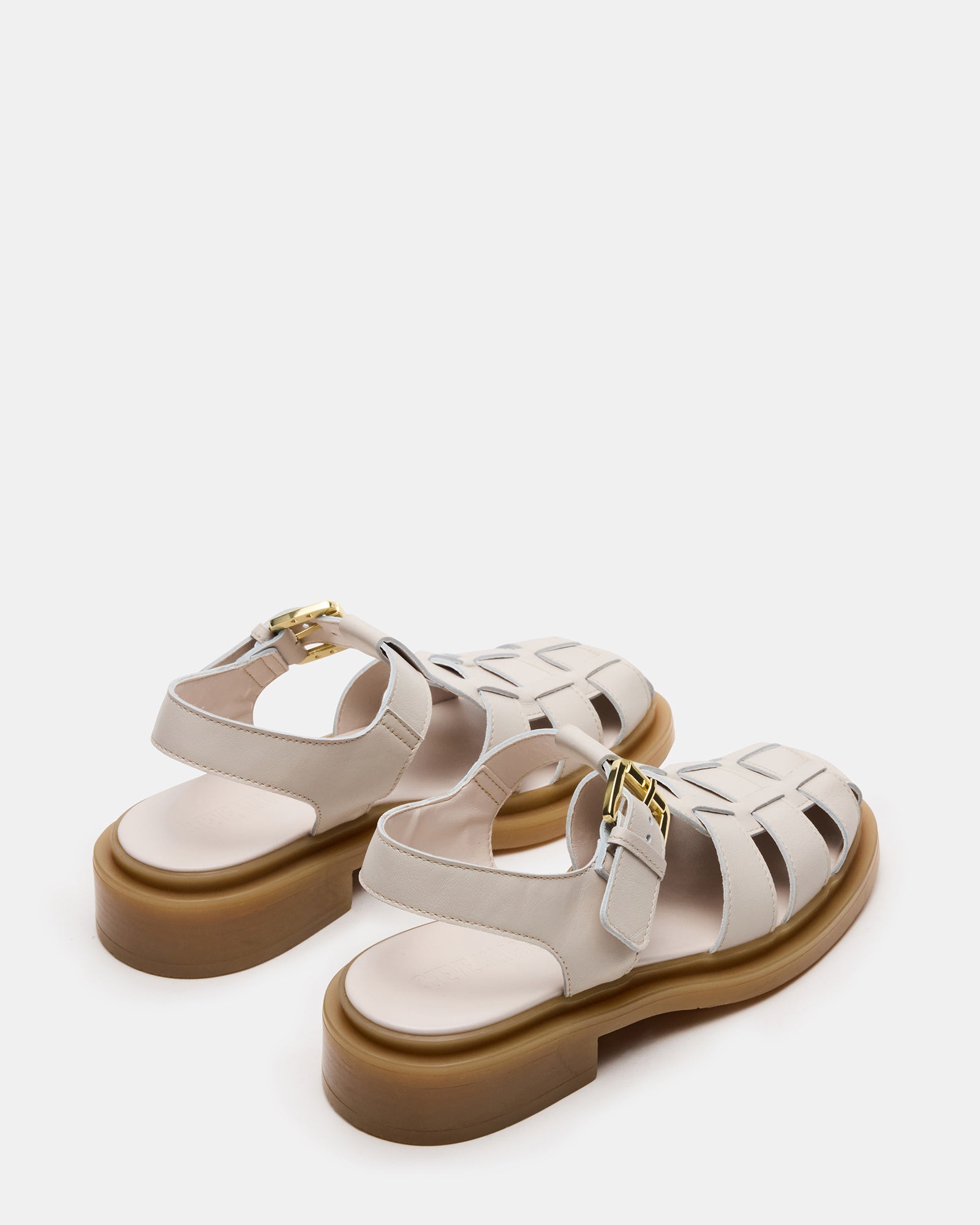 Mens fisherman sandals in natural sunlight showing textured leather details