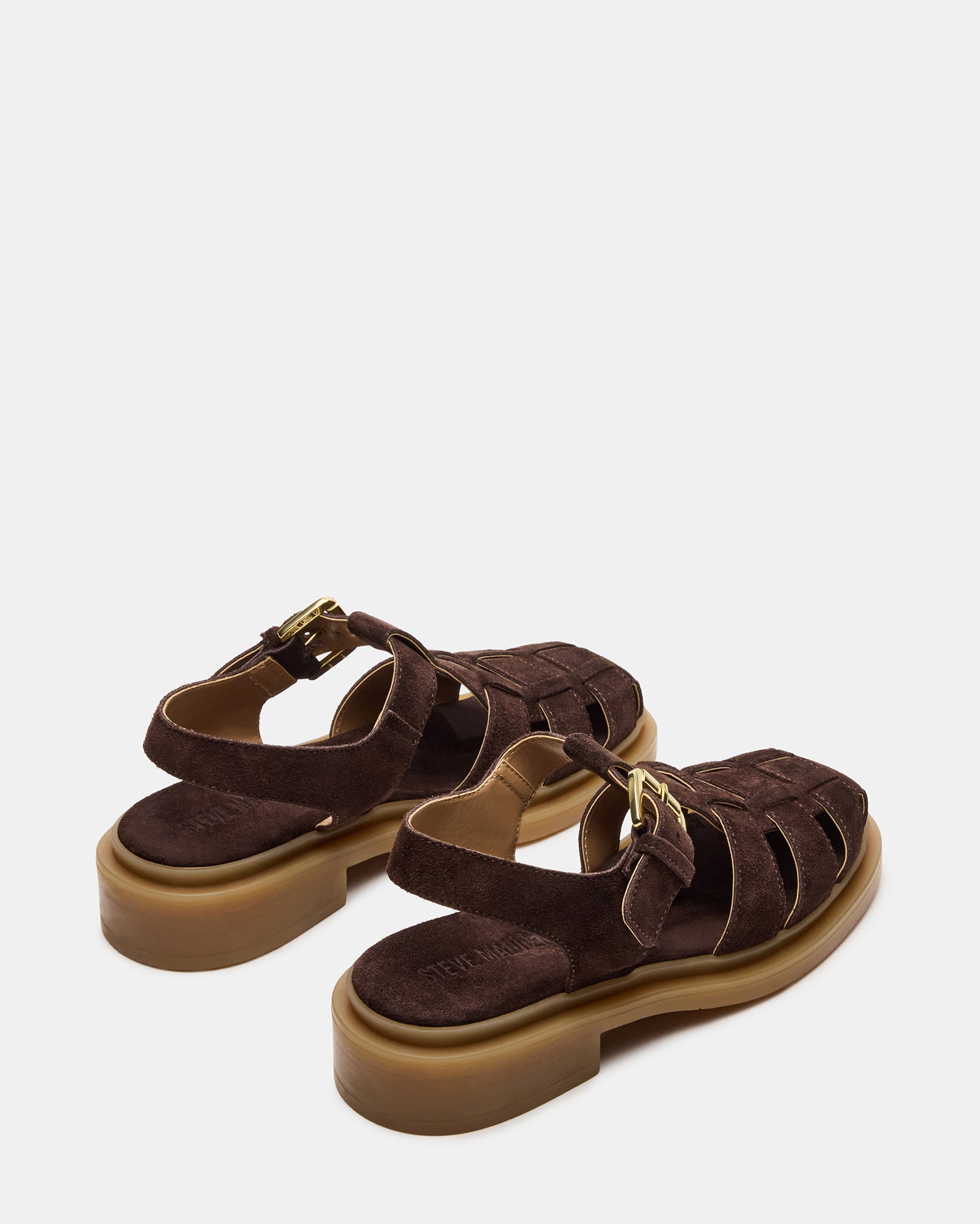 Close-up of synthetic lining in comfortable brown sandals for women.