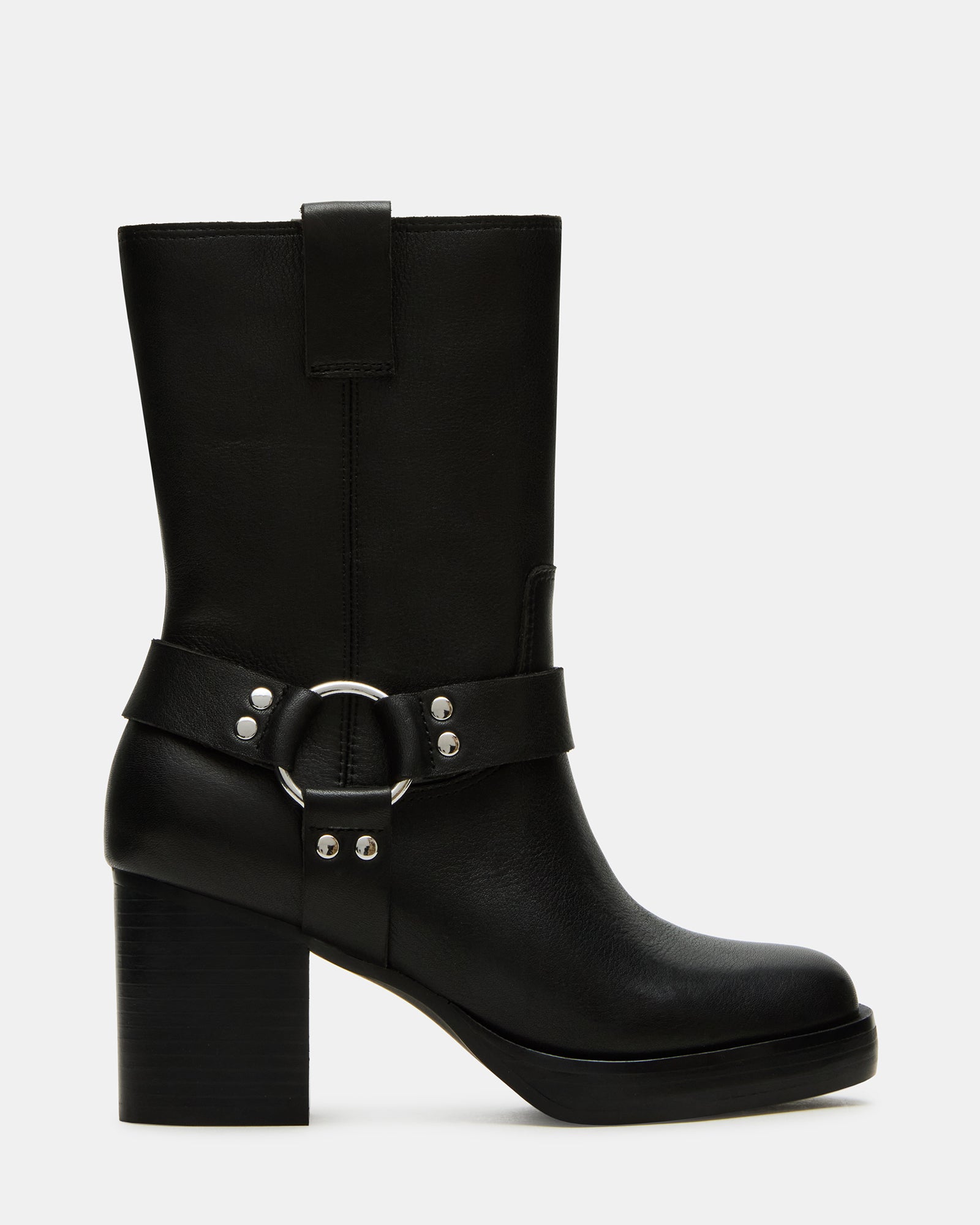 Side view of black leather Chelsea boots showcasing sleek silhouette and sturdy heel