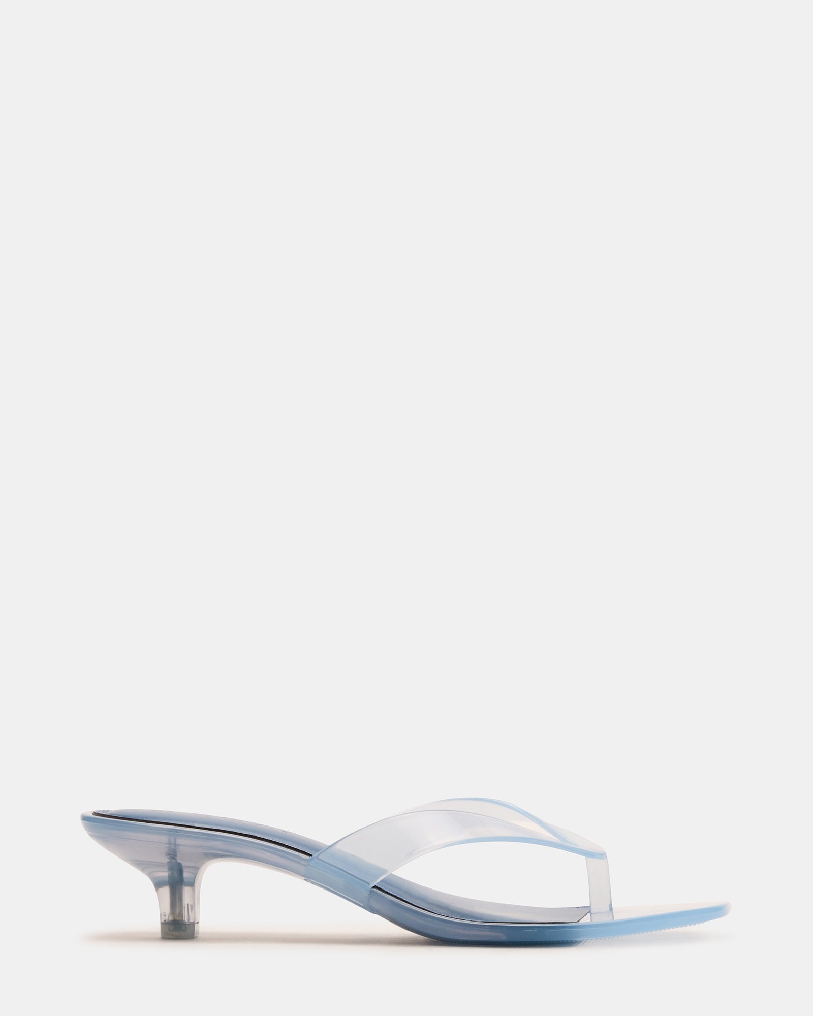 Chic light blue kitten heel sandals from the side, showcasing the square toe.