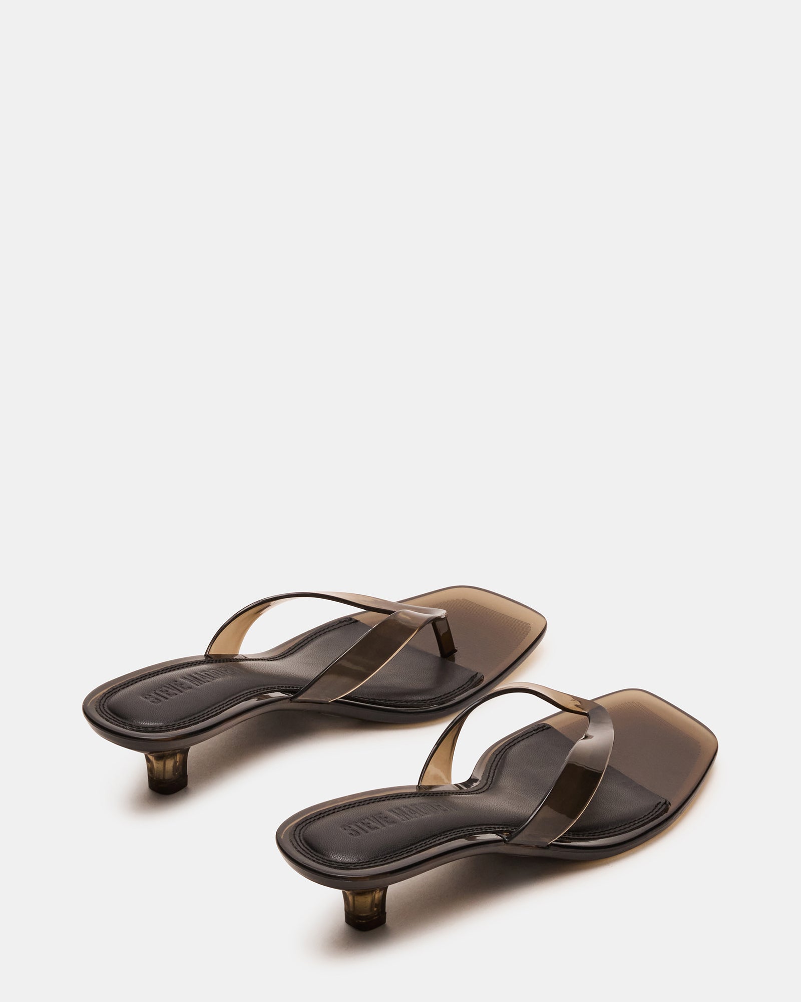 Tracie Jelly Smoke sandals styled with a formal outfit.