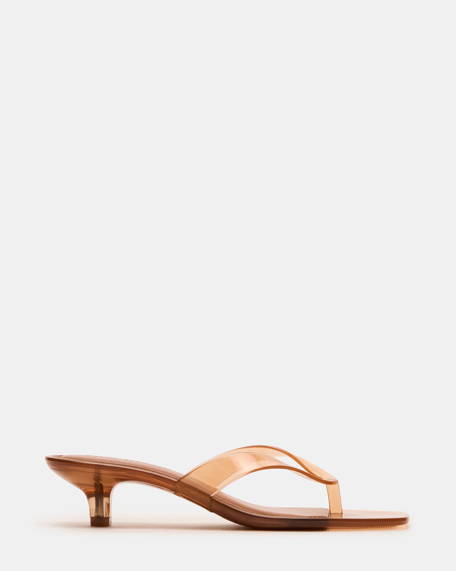 Black kitten heels from Tracie, styled with a midi dress for evening events.
