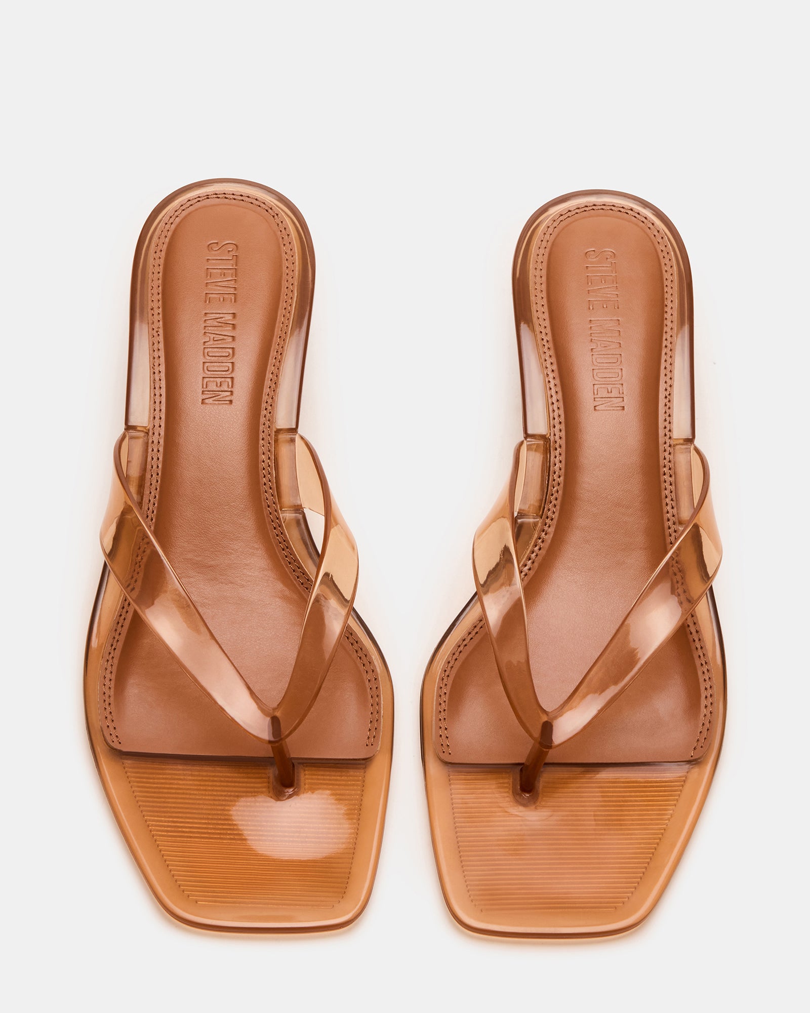 Side view of Tracies jelly tan heels showing textured PVC upper and 2-inch heel.