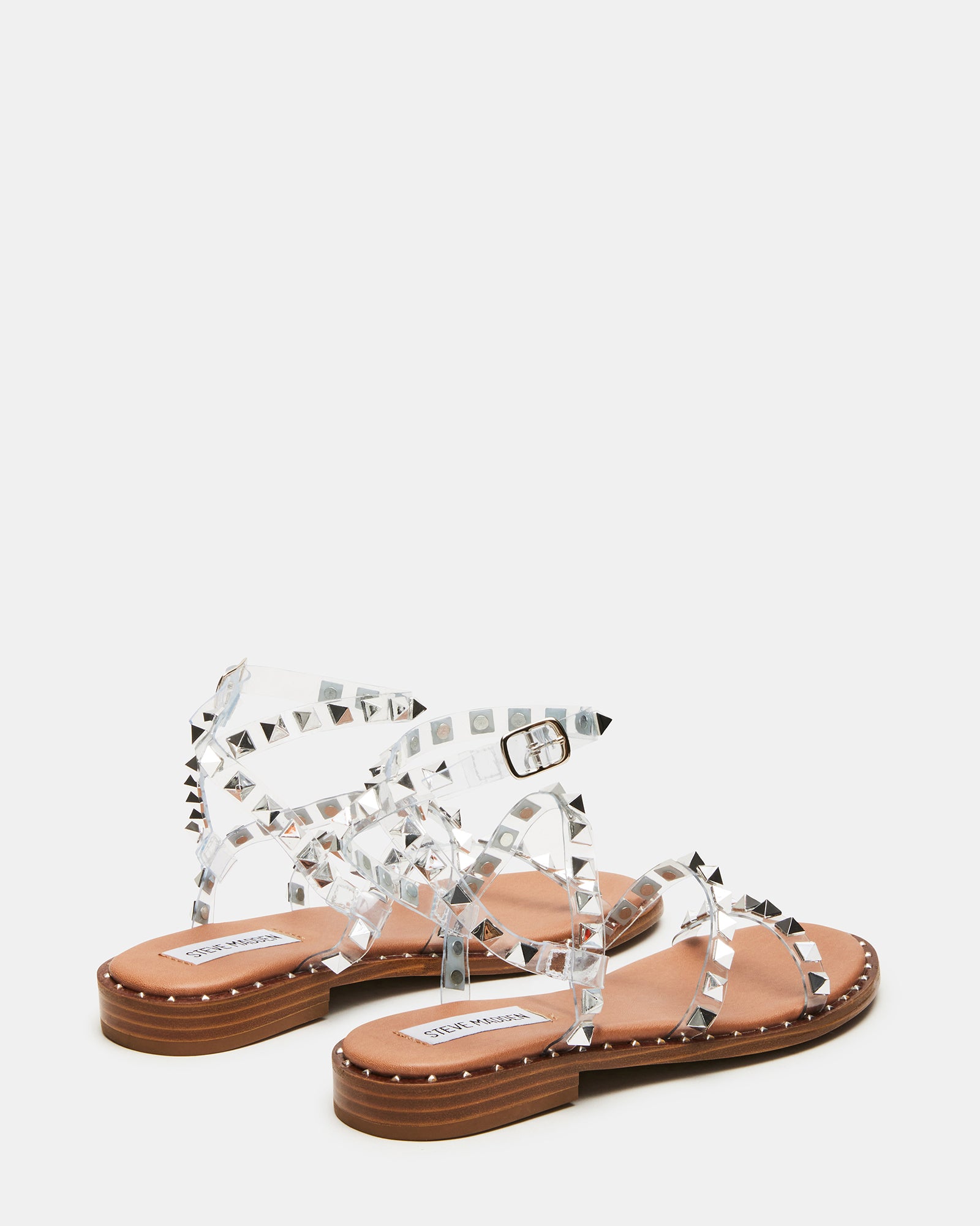 Side view of nude strappy sandals ideal for casual outings.