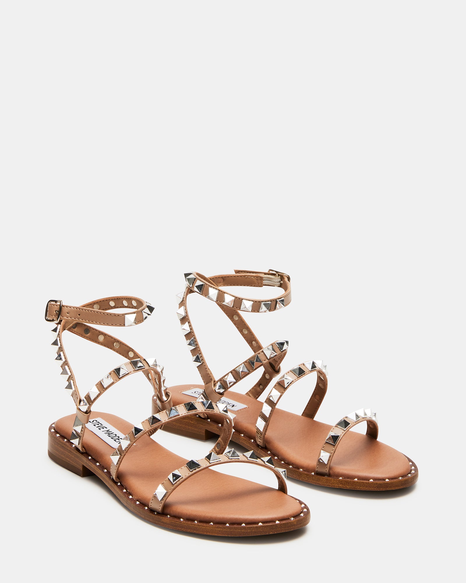 Fashionable vegan sandals with embellishments, ideal for summer outings