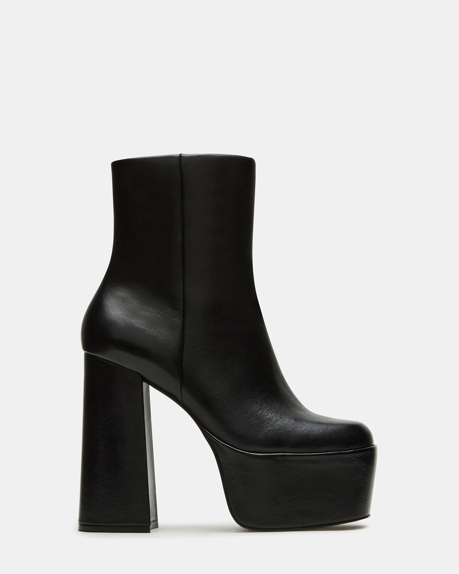 Angled view of Trillion black platform ankle boots showcasing the chunky heel.