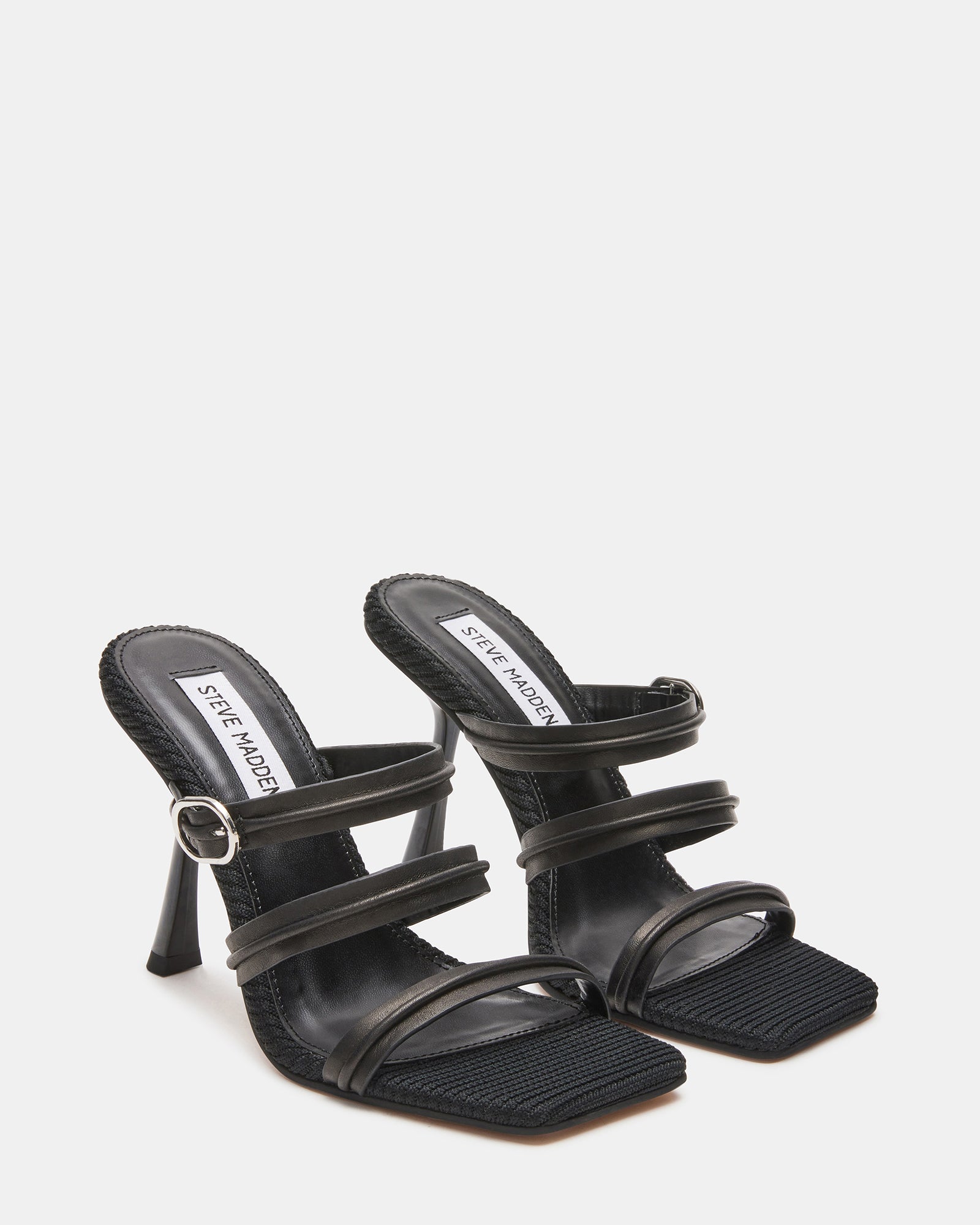 Close-up of the square toe design of Trin Black sandals