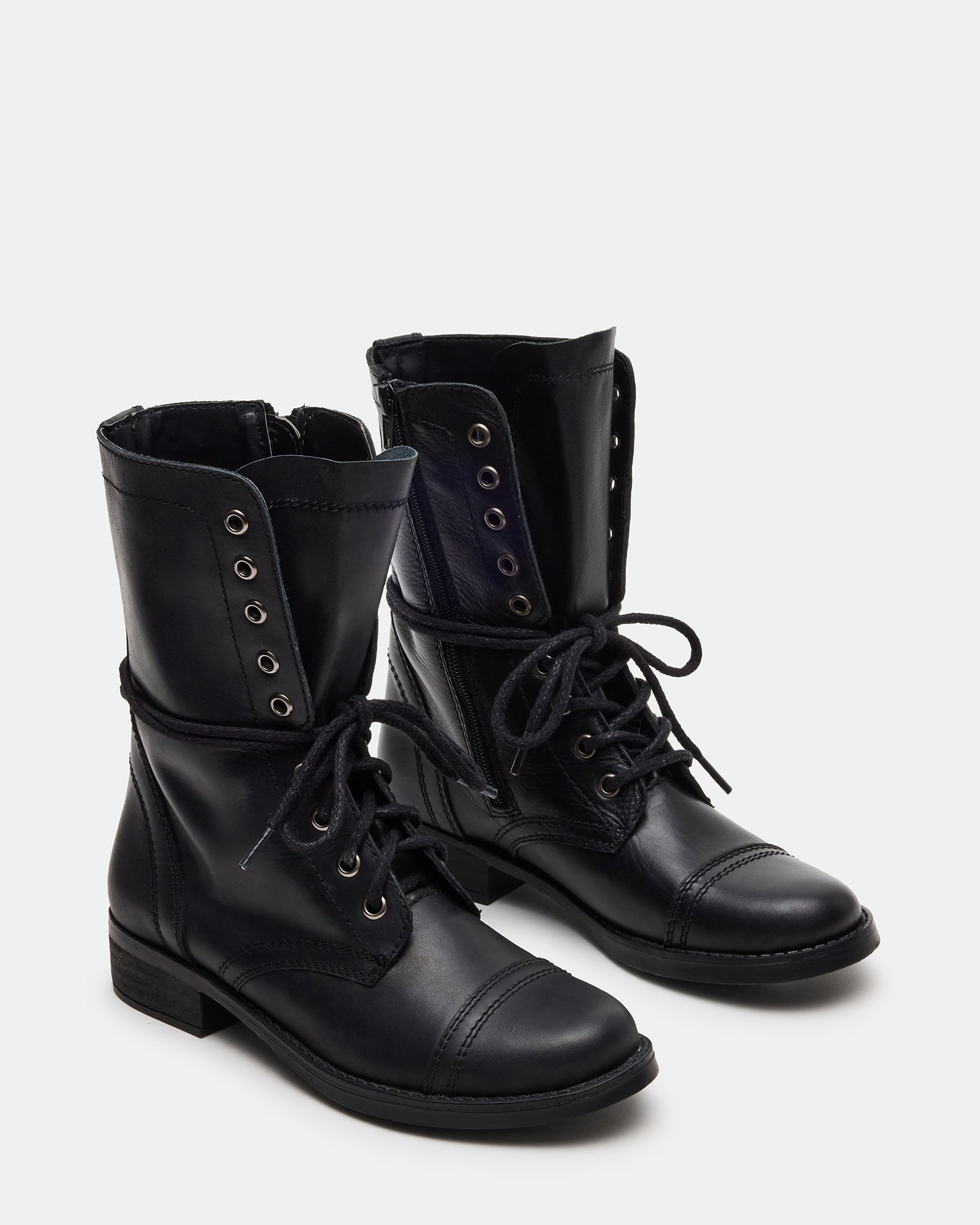 Brown leather boots comparison shot highlighting Troopa 3.0s matte finish