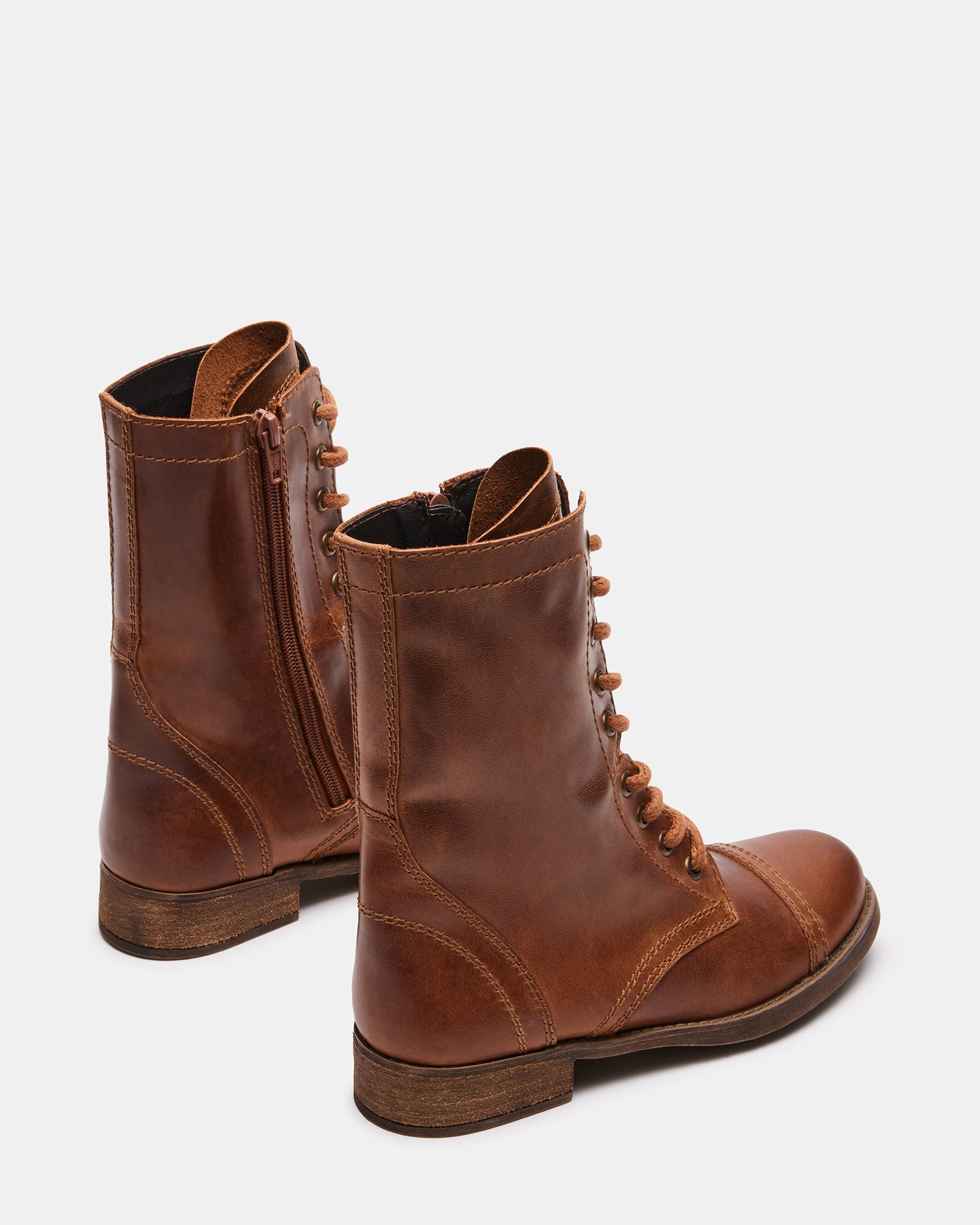 Close-up of Troopa 3.0 brown leather combat boots highlighting the stitching.