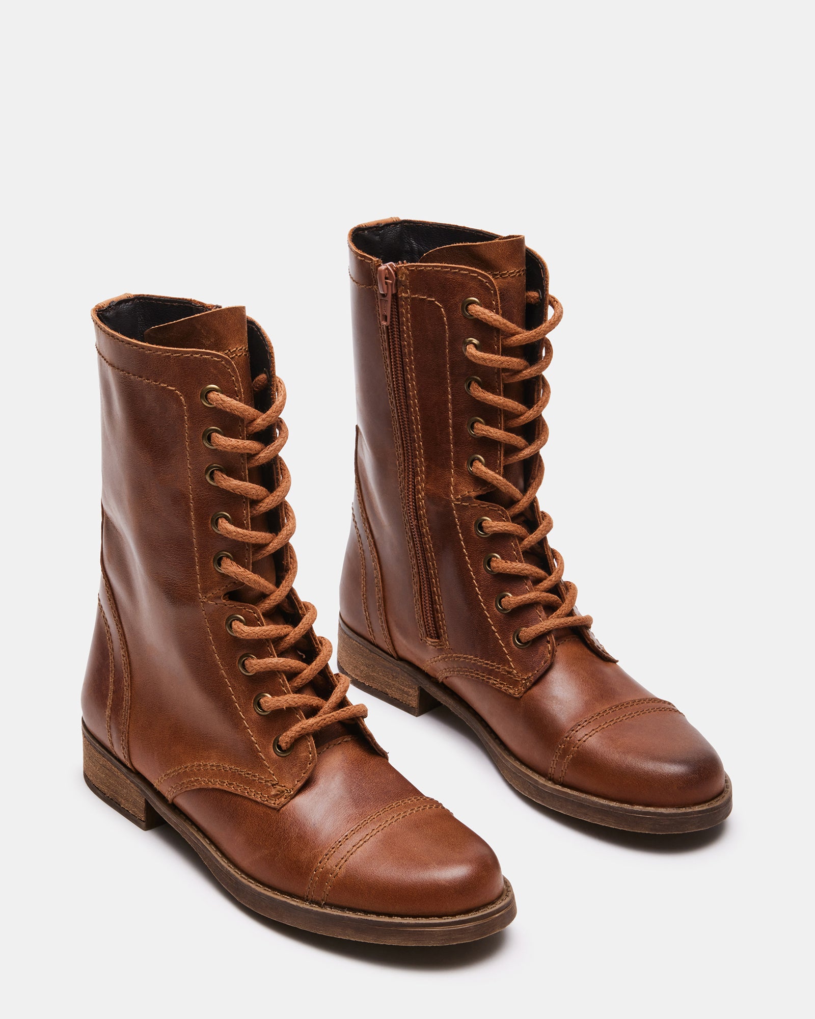 Close-up of Troopa 3.0 brown leather combat boots highlighting the stitching.