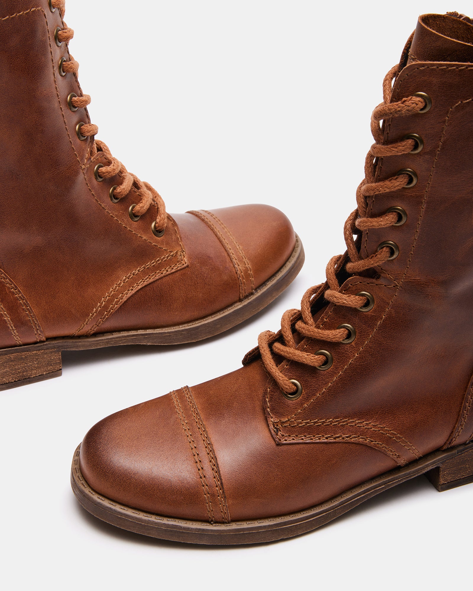 Troopa 3.0 brown leather combat boots worn during a city walk.