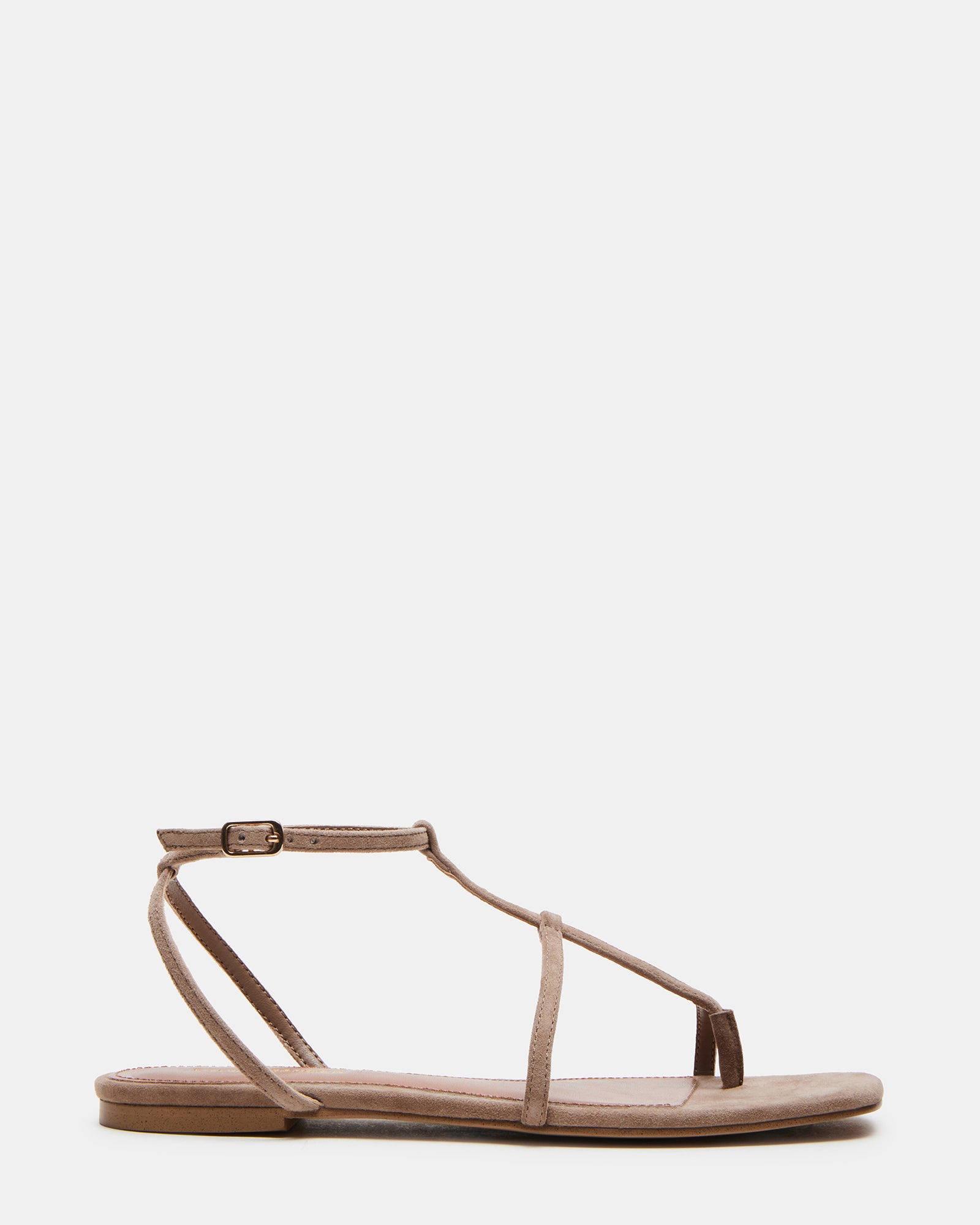 Top-down view of suede sandals showcasing square toe and strap detail