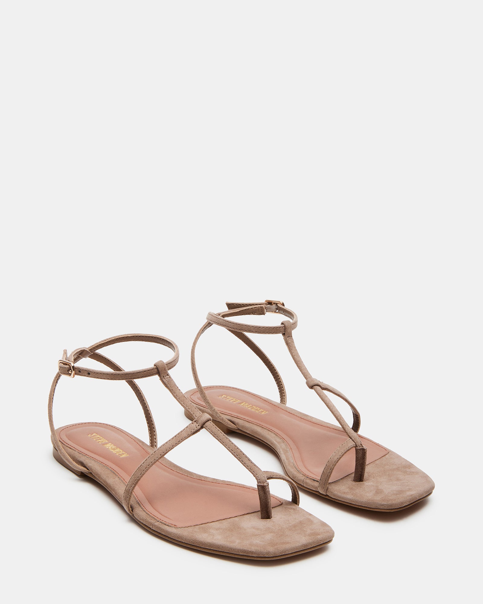 Profile angle of flat sandals women love for both comfort and elegance
