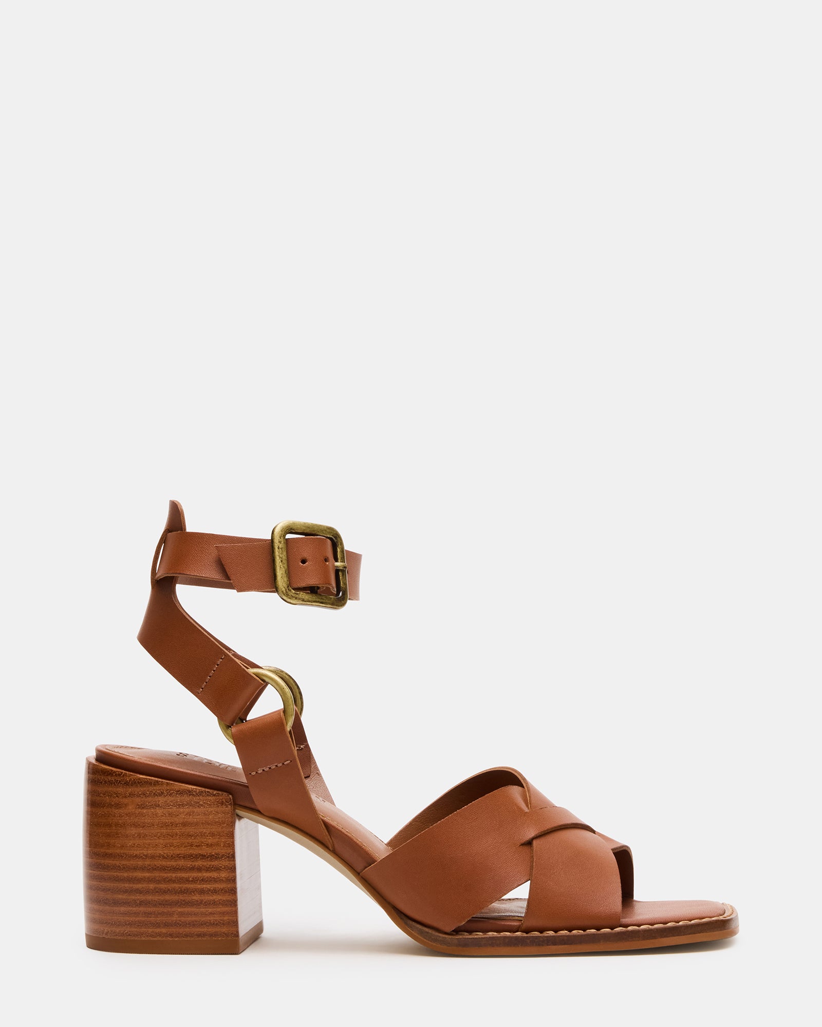 Side view of Truro tan leather block heel sandals showing strappy design and ankle buckle.