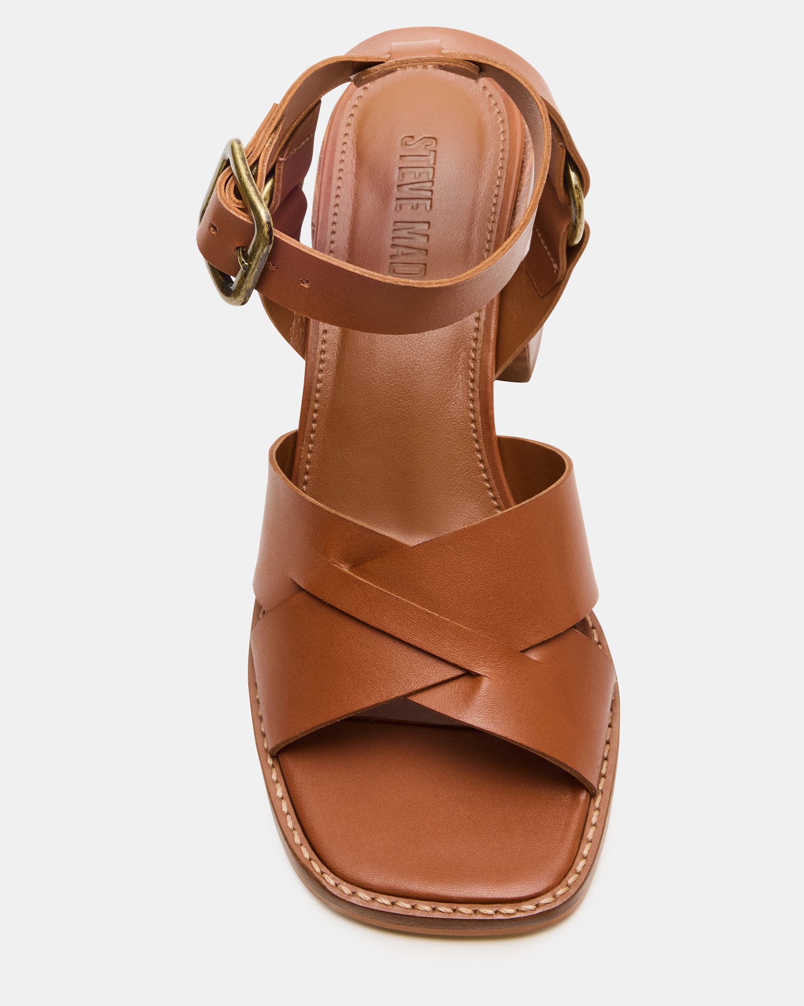 Side view of Truro tan leather block heel sandals showing strappy design and ankle buckle.