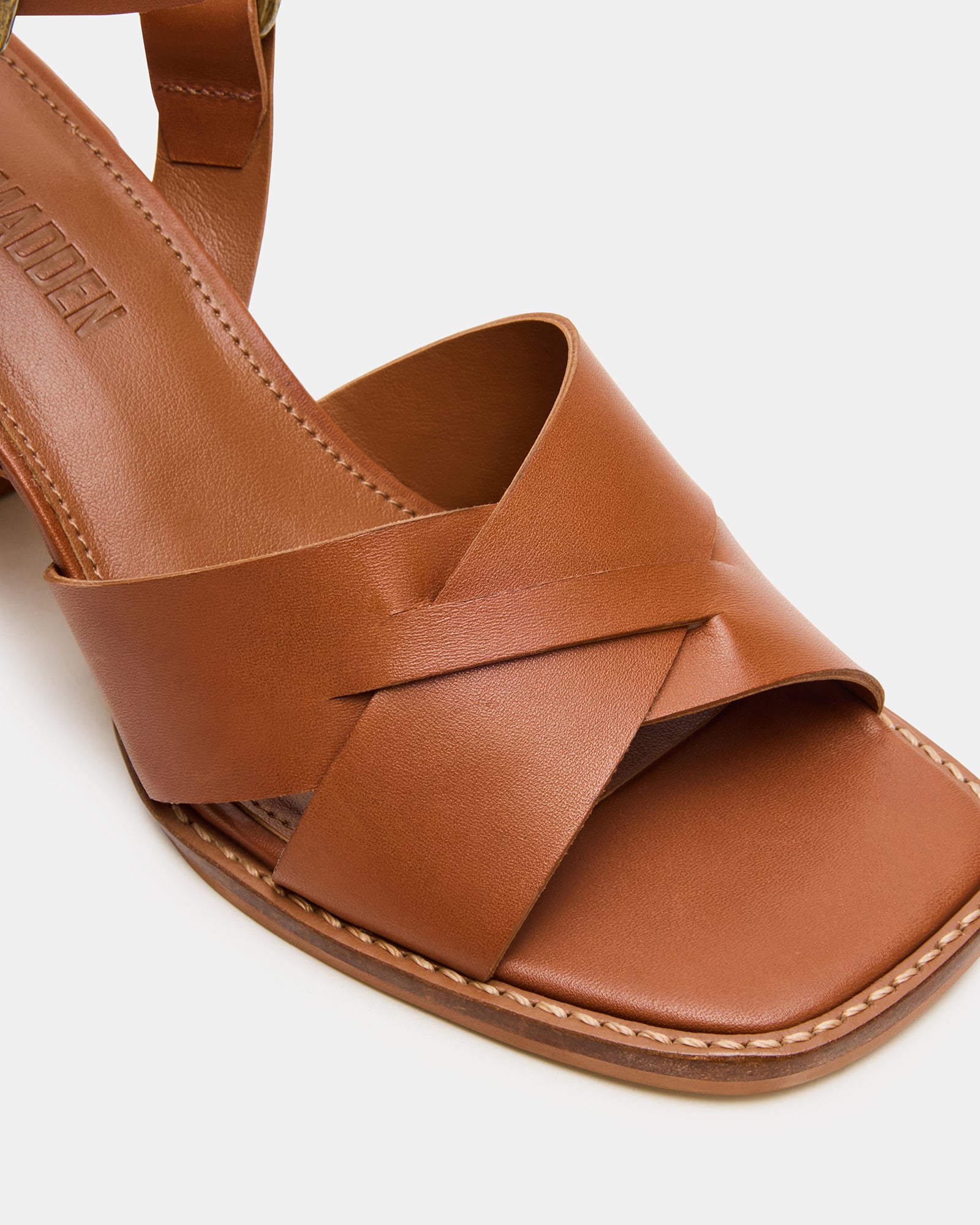 Model wearing Truro block heel sandals with a neutral-toned outfit.