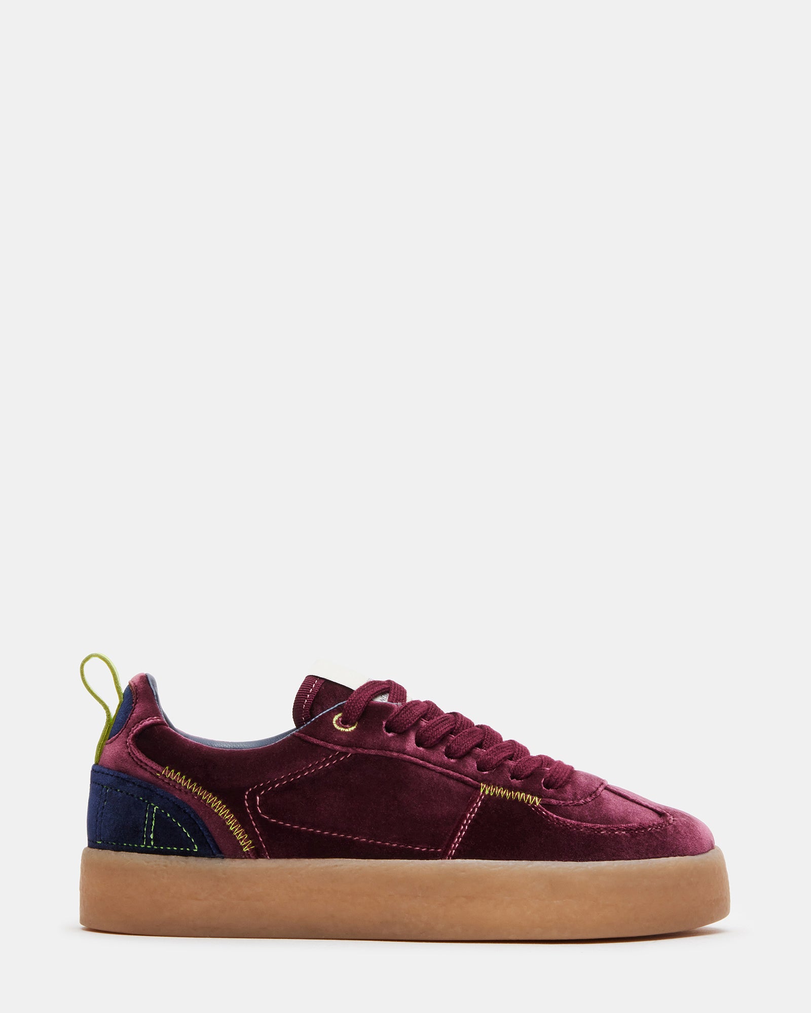 Close-up of Burgundy Tucker platform sneakers showing lace-up detail.