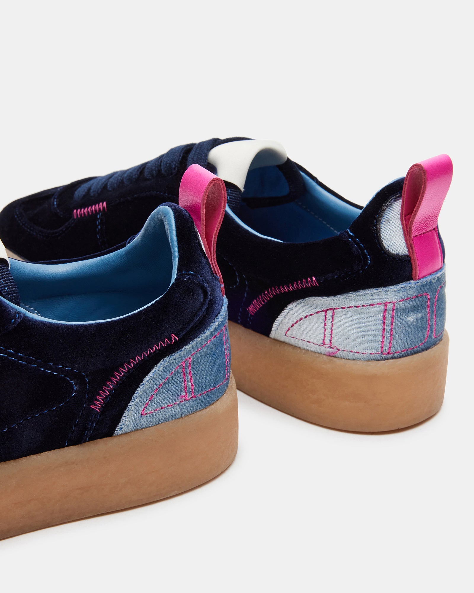 Tucker platform sneakers in navy multi color from the side view.