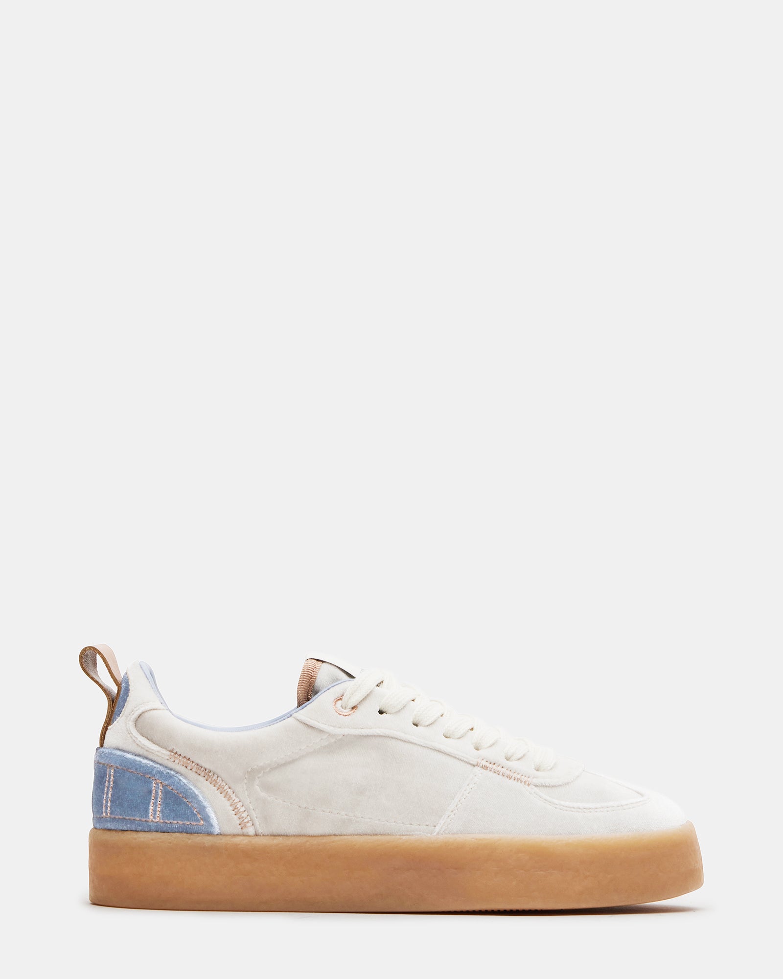 Elevate white platform sneakers displayed from the side, showcasing their stylish design.