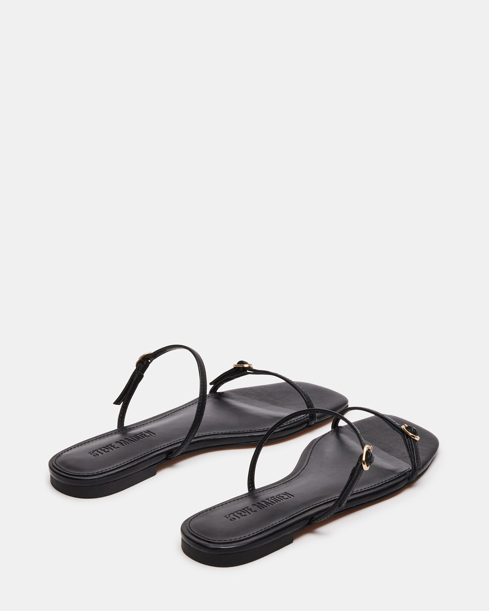 Top-down view of mens leather sandals styled for summer use