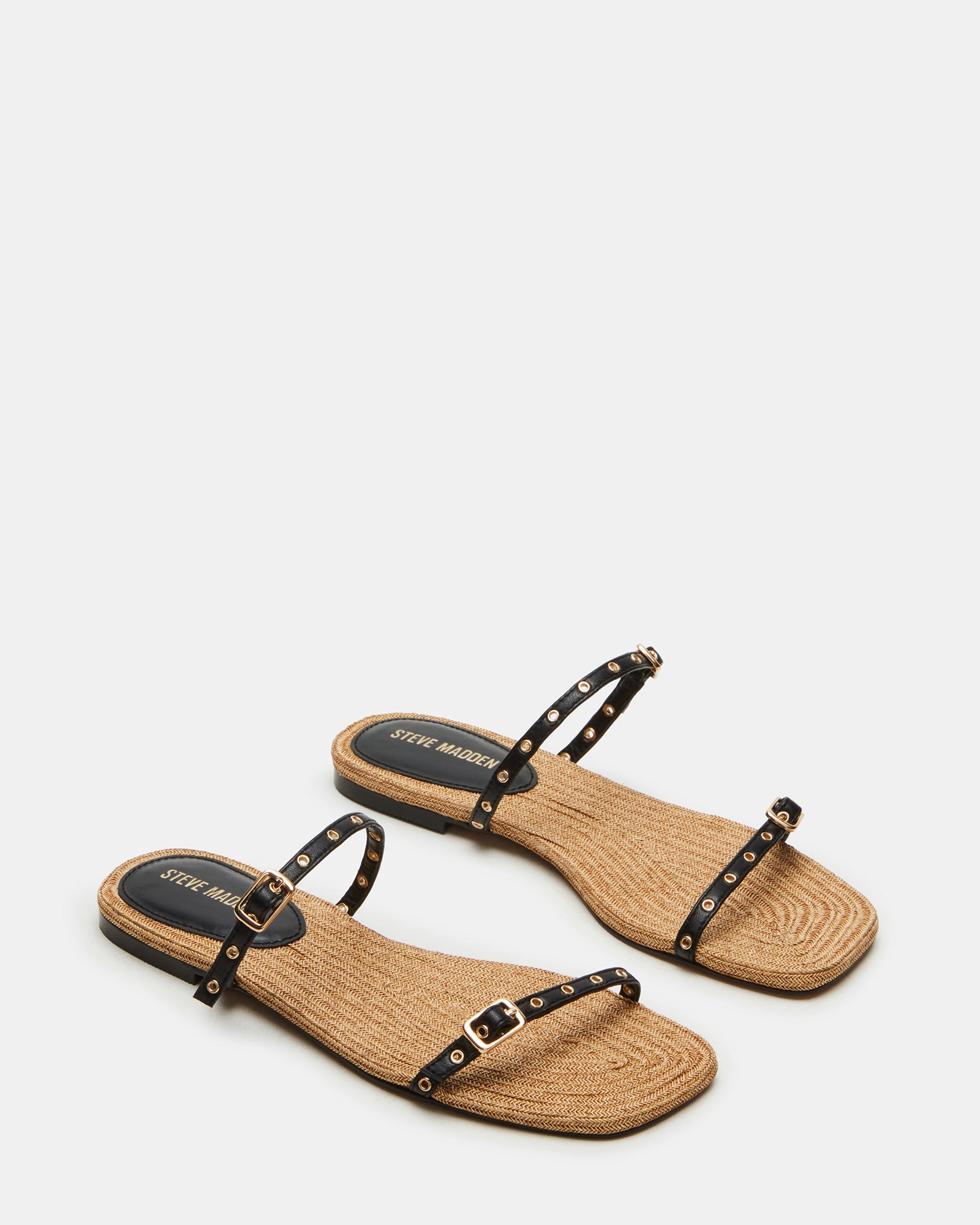 Close-up of Tundra sandals featuring thin straps and square toe design.
