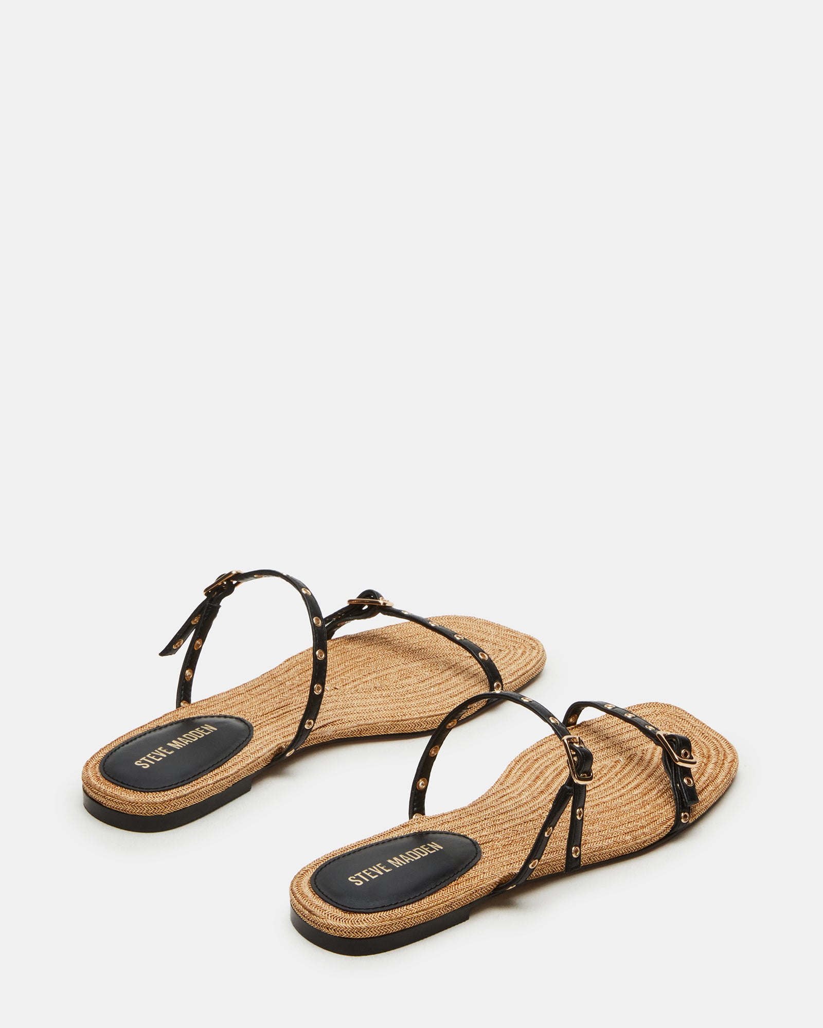Close-up of Tundra sandals featuring thin straps and square toe design.