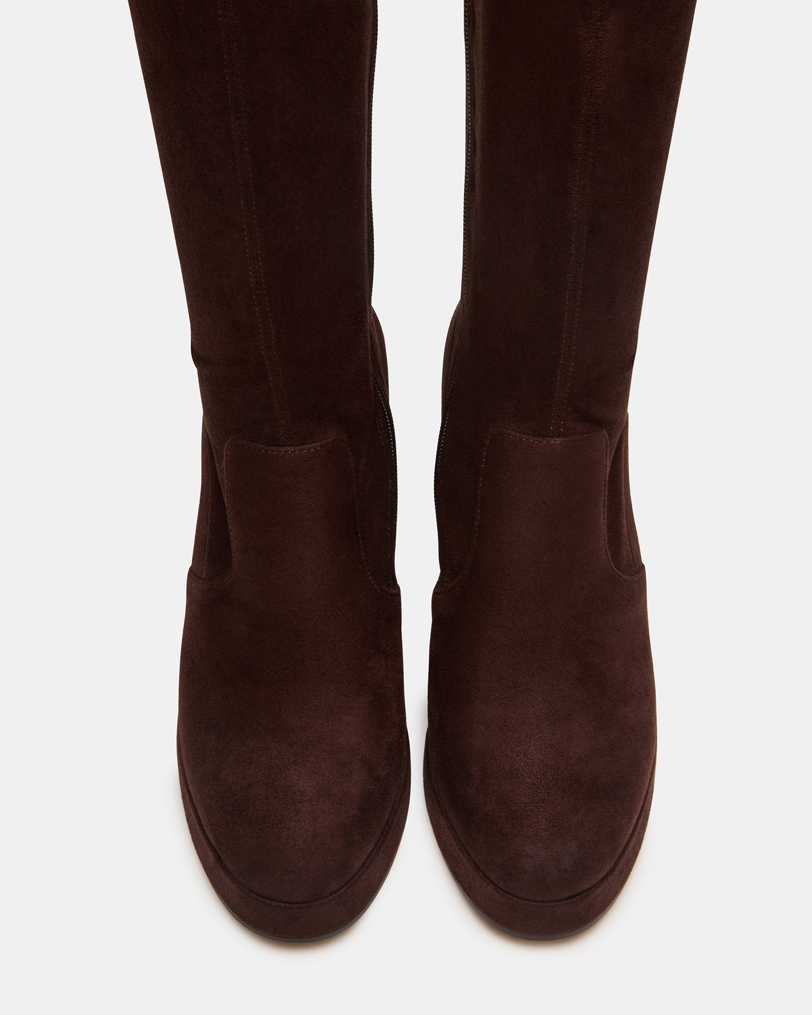 Brown knee-high boots with a block heel, showcasing comfort and style.