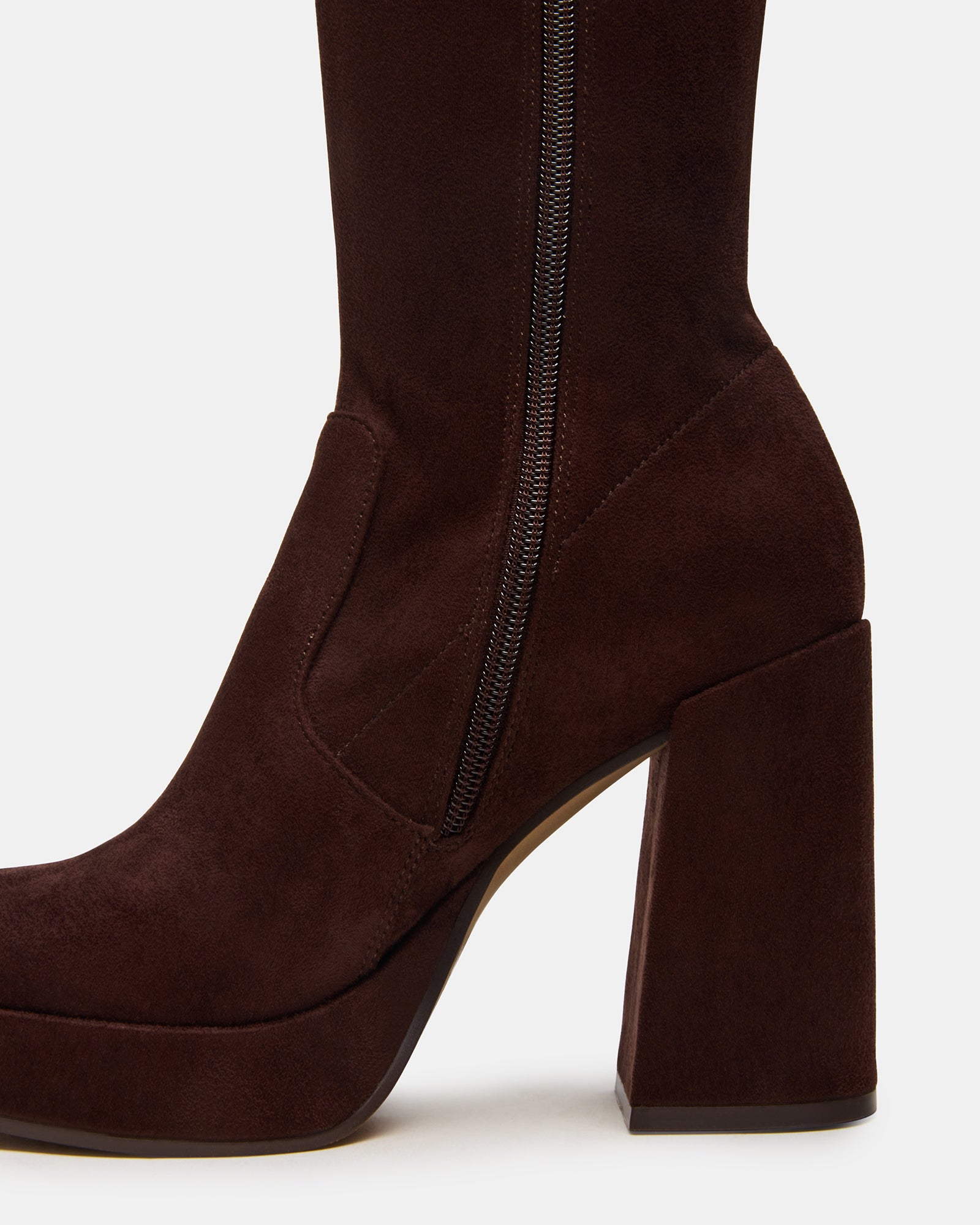 Elegant brown knee high boots with an inside zipper for easy wear.